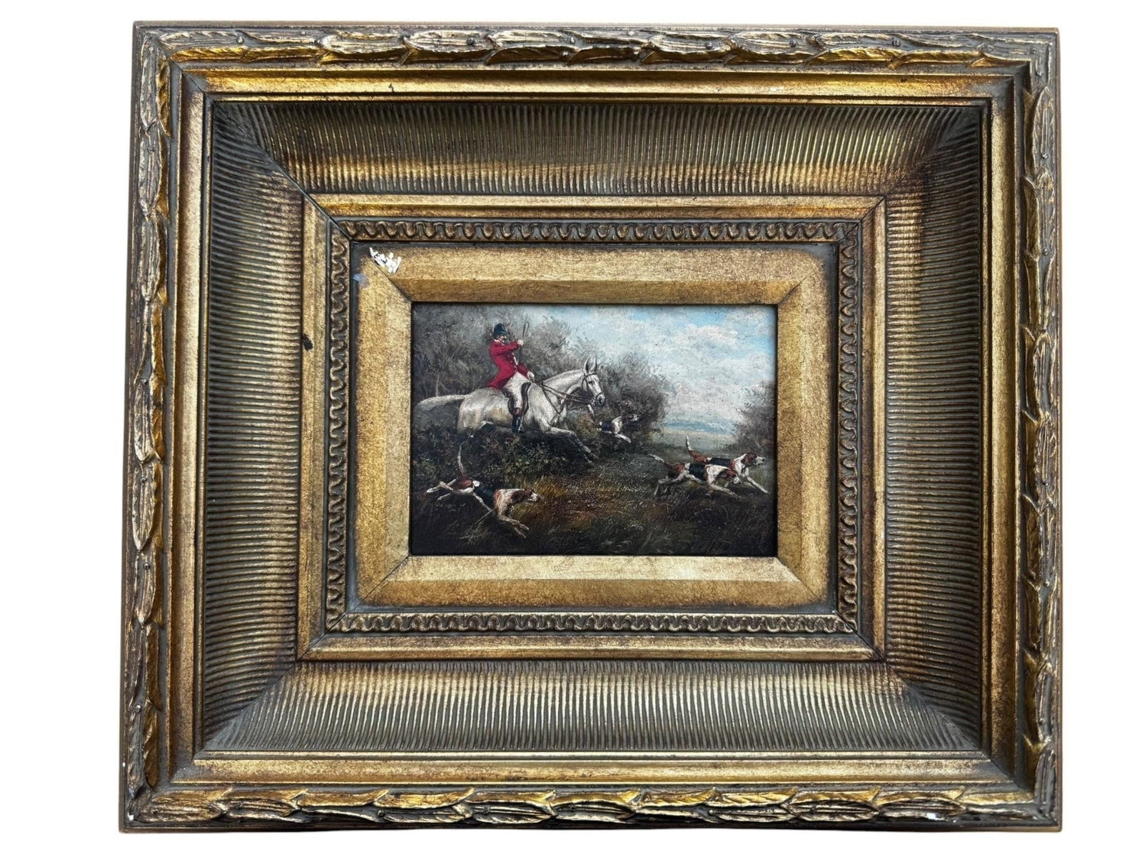 English school Hunting Painting Reproduction: English School fox hunting scene reproduction, 20th century. Oil on canvas depicting a traditional mounted huntsman in a scarlet hunting coat astride a grey horse leading a pack of hounds across the c