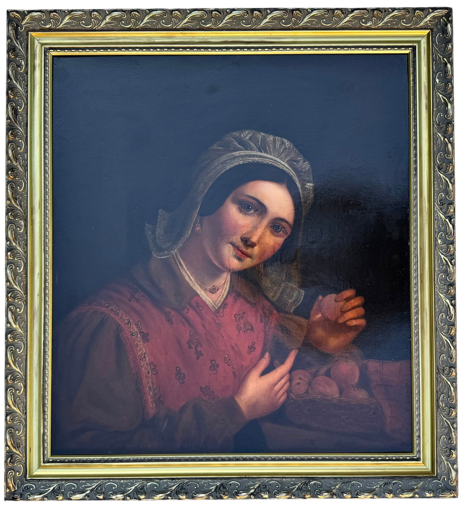 Early 19th Century Italian School Portrait of a Young Woman with Apples: Early 19th century Italian School oil on canvas depicting a beautiful young woman seated beside a basket of apples. The sitter is rendered with delicate features, softly modeled flesh tones, lace-trim