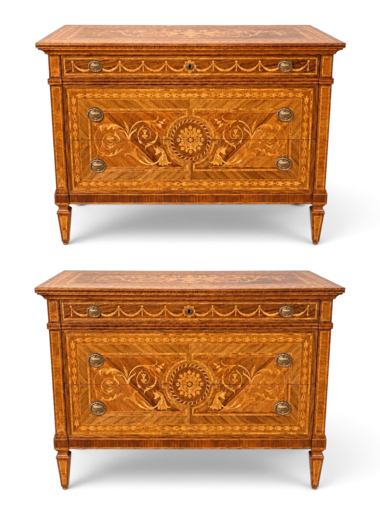 Pair of Italian Neoclassical Style Marquetry Inlaid Chests, in the Manner of Giuseppe Maggiolini: A finely decorative pair of Italian Neoclassical style chests in the manner of Giuseppe Maggiolini, 20th century. Each richly veneered and extensively inlaid with contrasting woods. The rectangular to