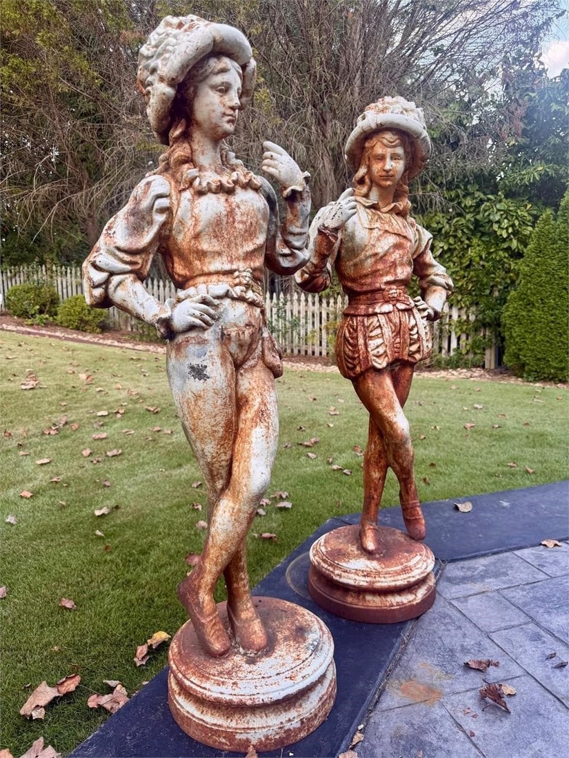 Pair Life-Size Cast Iron Renaissance Figures: Large pair of cast iron statues of Swiss Renaissance Guards, late 19th to early 20th century.Impressive Large pair of cast iron garden statues modeled as Swiss Guards in Renaissance-style uniform with