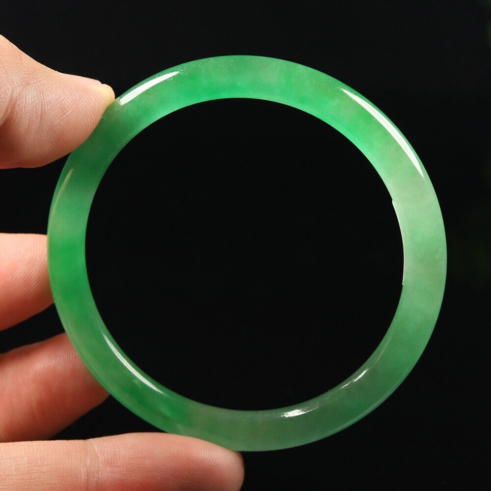 Chinese natural green jade bangle: Size: Width 56 mm - Thickness 7 mm Materials: Natural jade Time Period: qing dynasty Manufactured Date: qing dynasty Origin: China