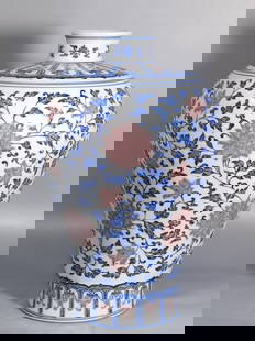 A blue and white underglaze red plum vase with lotus pattern Qianlong mark Qing Dynasty: Size: Height 35.2 cm - Width 23 cm Materials: Porcelain Time Period: Qing dynasty Manufactured Date: Qianlong Mark & Period Origin: China
