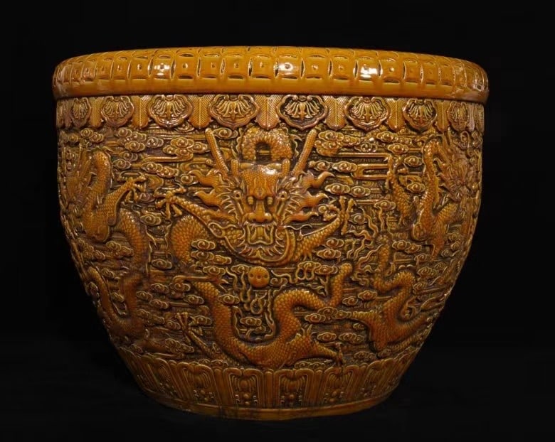 Qing Dynasty Qianlong period yellow-glazed high-relief nine-dragon motif porcelain basin: Size: Height 41 cm - Width 53.5 cm Materials: Porcelain Time Period: Qing dynasty Manufactured Date: Qianlong Mark & Period Object: Chinese Antique ⛨ Purchase With Confidence ✔ Veri