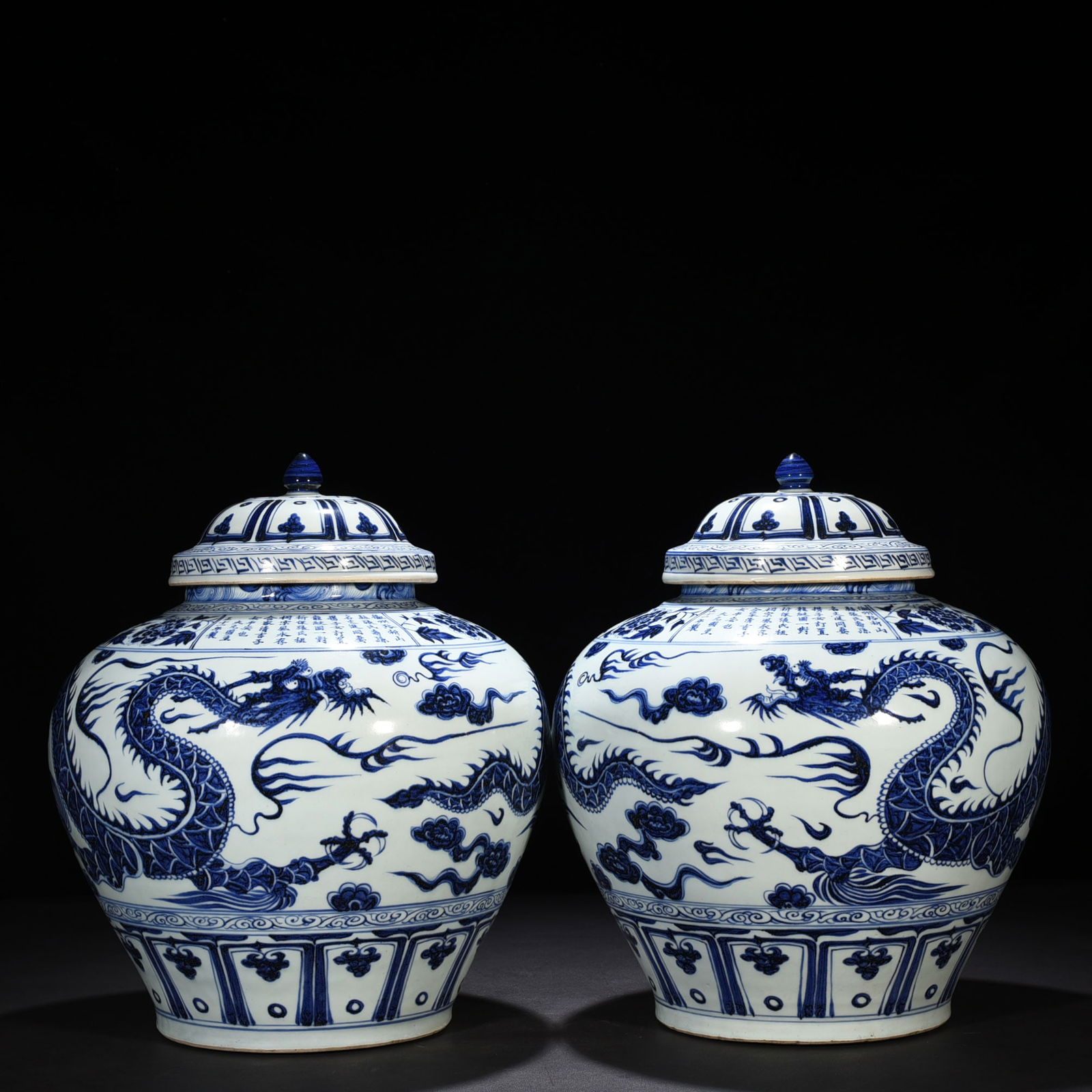 Yuan dynasty blue and white inscribed Yunlong covered jar pair (1 of 9)