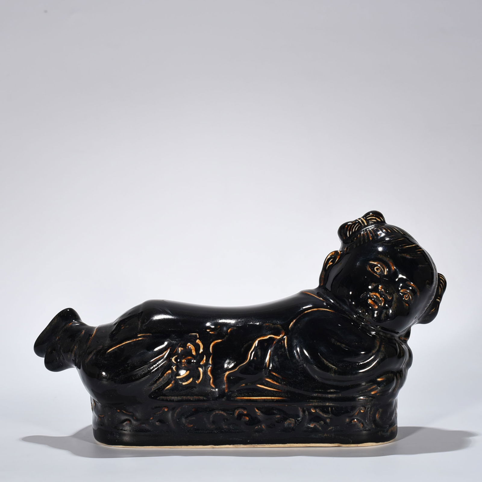 Song Dynasty Ding Kiln Jiatai three-year black glaze doll pillow (1 of 8)