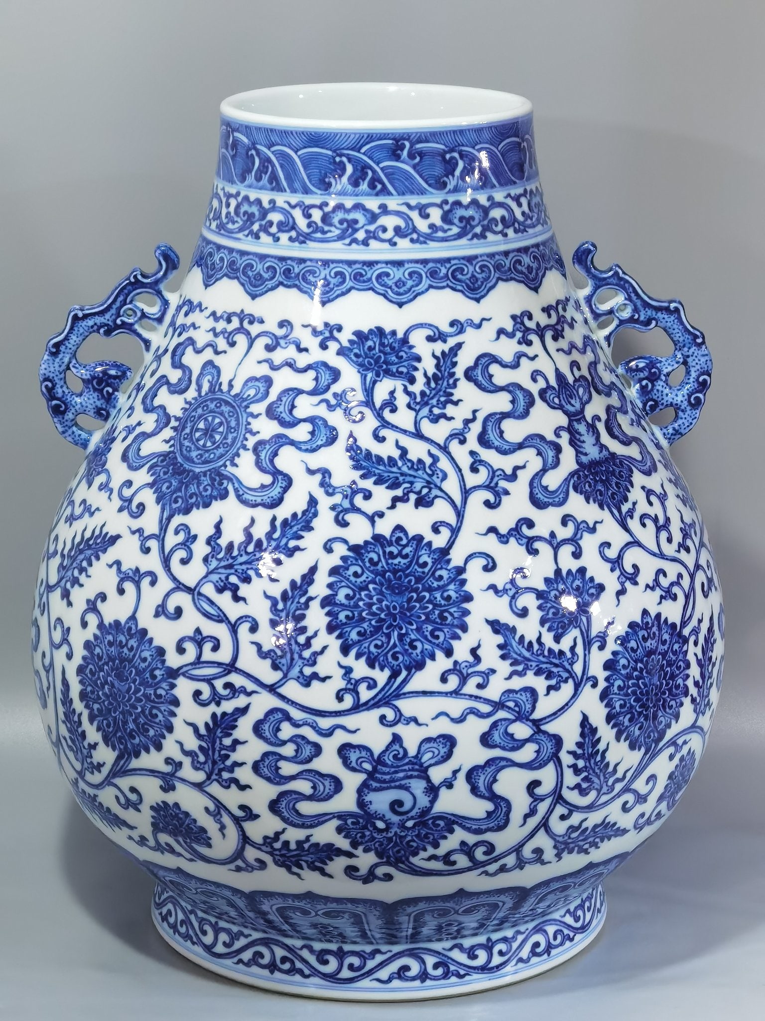 Qianlong period Qing Dynasty blue and white eight treasures lotus and lucky ears vase (1 of 9)