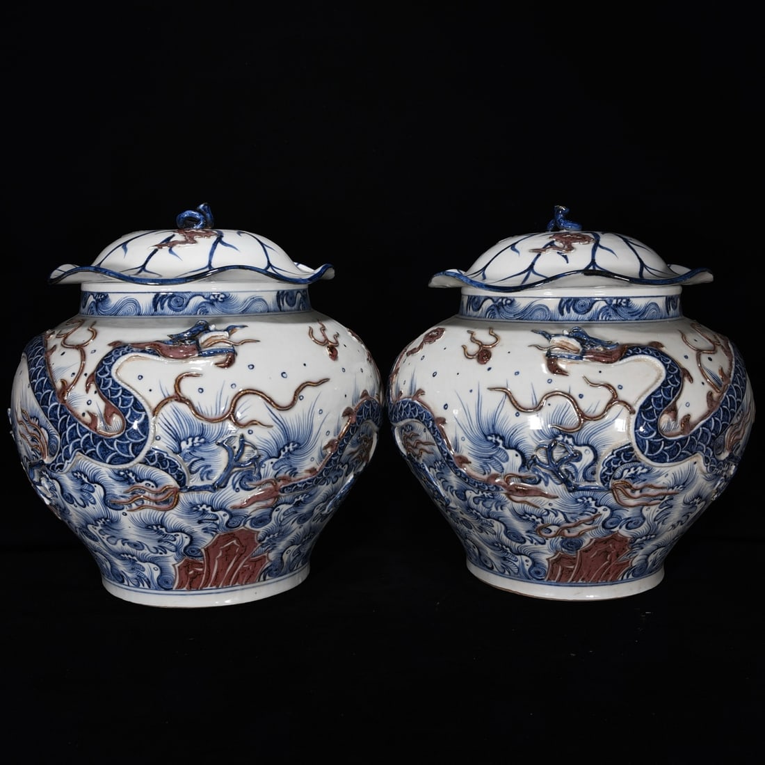 Yuan Dynasty blue and white underglaze red lotus leaf dragon relief jar pair: Size: Height 36 cm - Width 34 cm Materials: Porcelain Time Period: Yuan dynasty Manufactured Date: 13th-c Period Object: Chinese Antique ⛨ Purchase With Confidence ✔ Verified Auctio