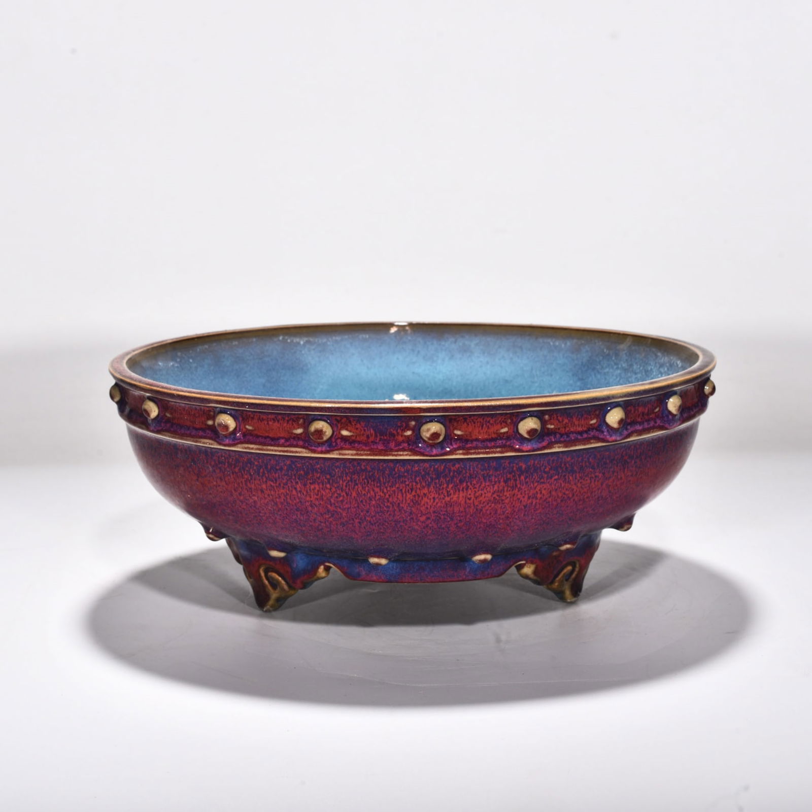 Song Dynasty Jun kiln rose purple inner blue glaze drum nail three-legged wash (1 of 7)
