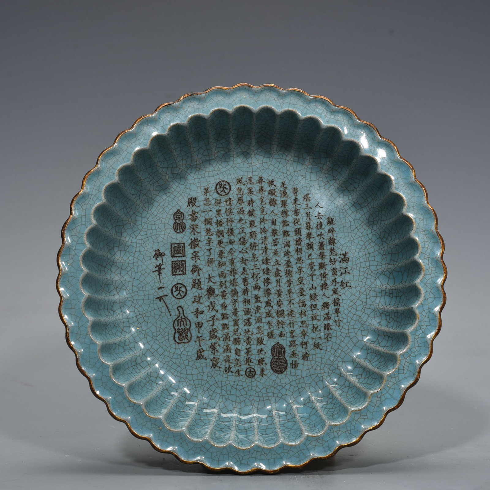 Song Dynasty Ru Kiln azure glaze with inscribed chrysanthemum petals and inlaid gilt buckle plate: Size: Width 24 cm - Height 5 cm Materials: Porcelain Time Period: Song dynasty Manufactured Date: 10th-c Period Object: Chinese Antique ⛨ Purchase With Confidence ✔ Verified Auction