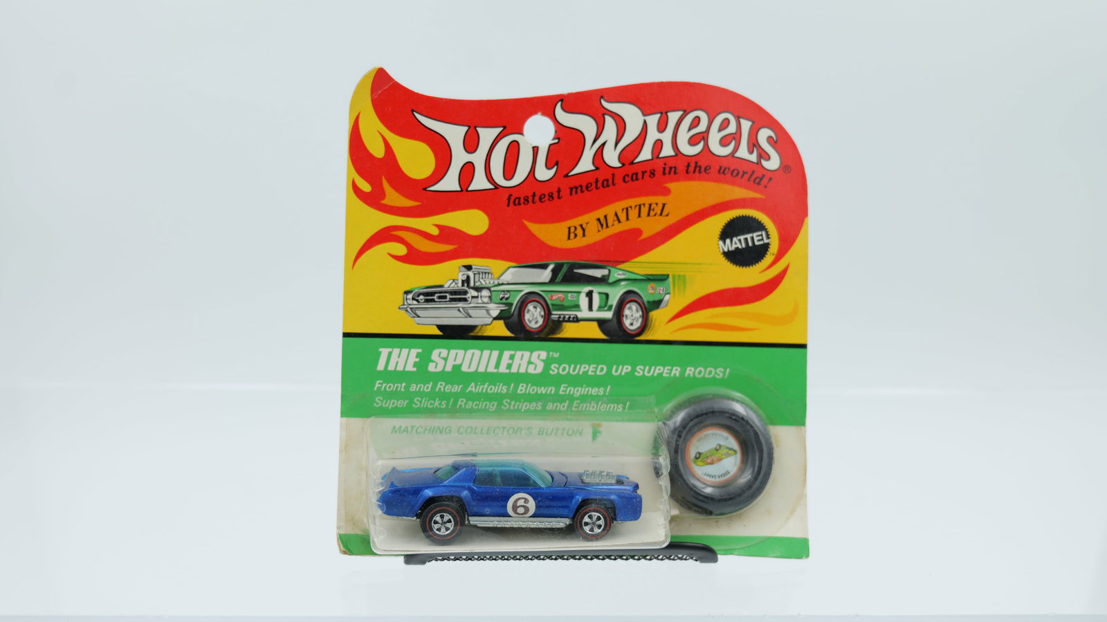 Hot Wheels "The Spoilers" SugarCaddy, blister pack: Blister is clear and firmly attached, there is a hairline crack at the top right corner. Card looks bright with no holes or rips. Car itself is standard blue with dark interior, brilliant base, no ton