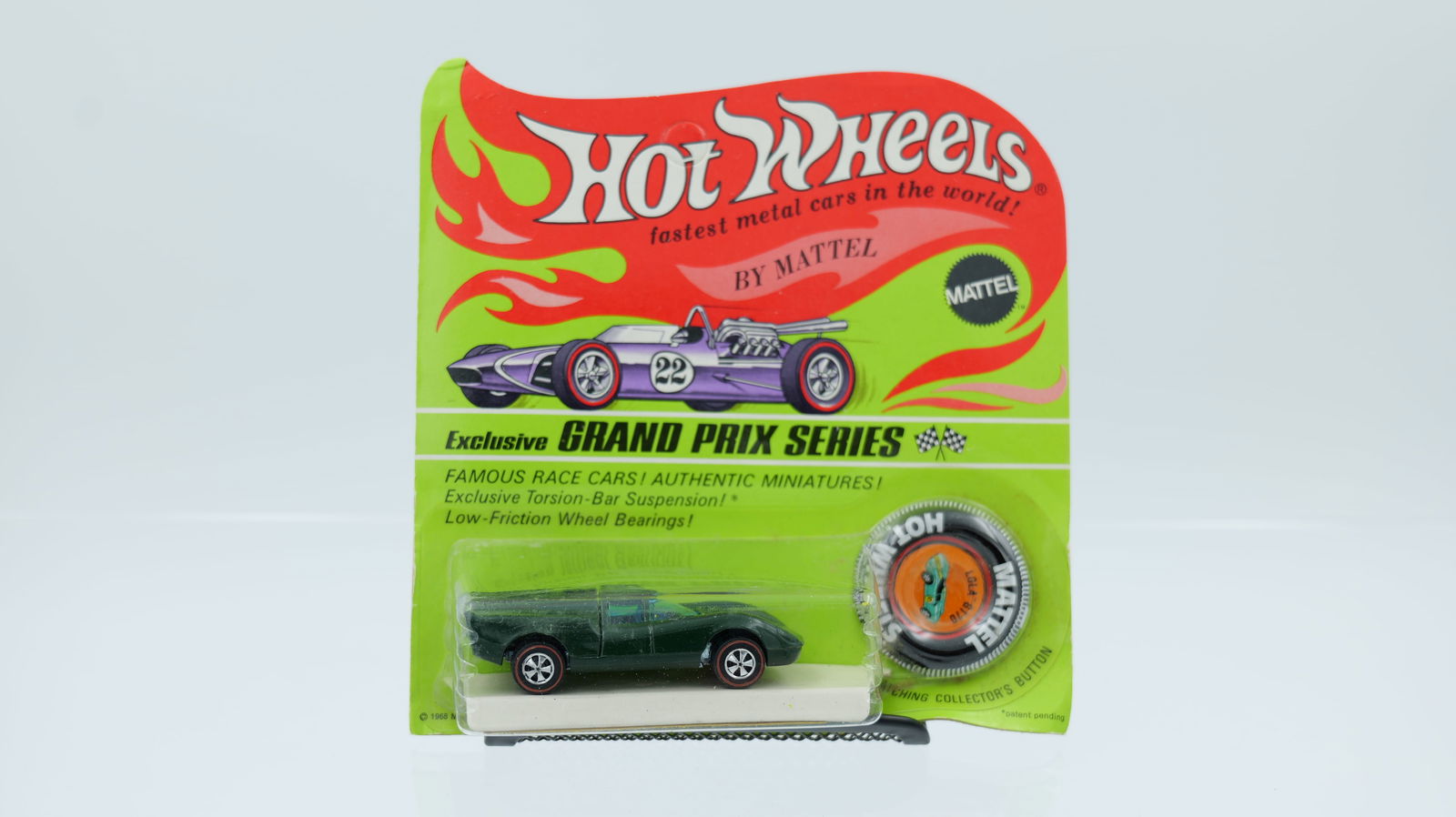 Hot Wheels Redline "Grand Prix Series" Lola GT70, blisterpack: Lola GT70 enamel green, Hong Kong. Blister is clear, crack free and firmly attached. The card is bright with no holes, rips, or creases. Base is brilliant, wheels and paint are both great