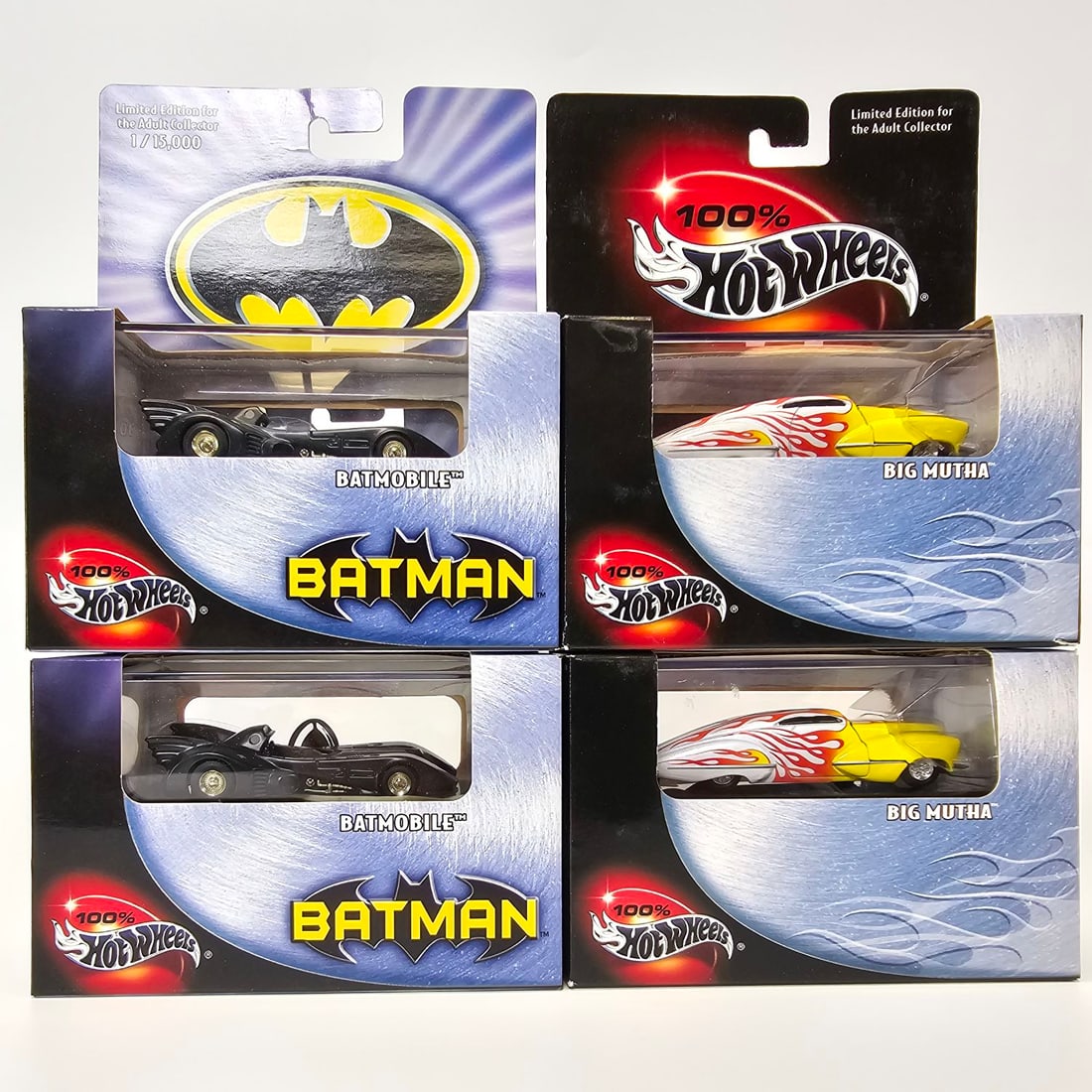 100% Hot Wheels Lot: (4) 100% Hot Wheels Cars including (2) Batmobiles, and (2) Big Muthas. All boxes/cards seem to be bright with no creases, veins, rips, or holes. All windows appear to be clear and free of major damage