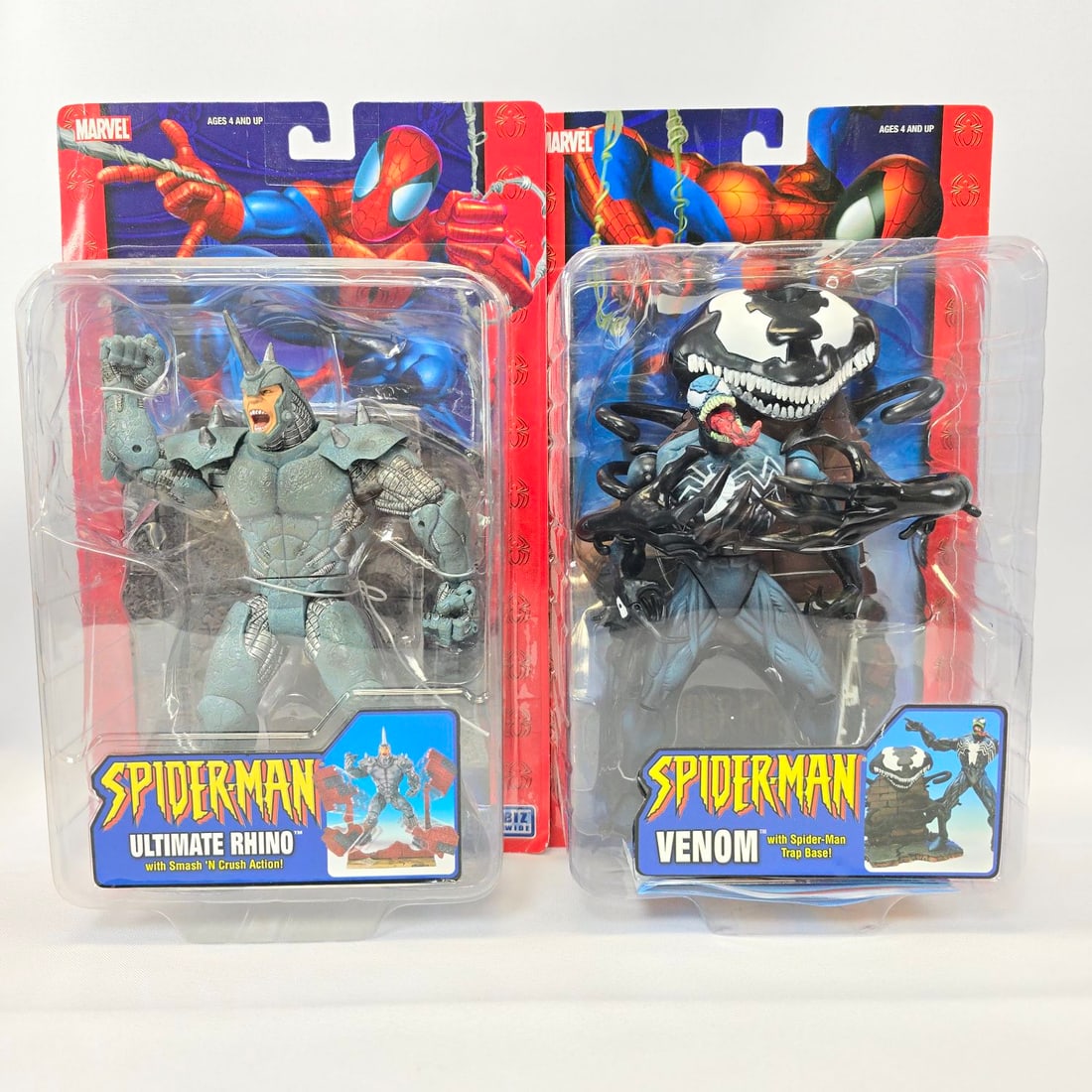 Marvel Spider Man 2004 Toy Biz action figures: Toy Biz Worldwide Spider man action Venom and Rhino figures. Both are sealed and in good condition The cards do have some curling at the corners and small veins and the blisters are clear and firmly a