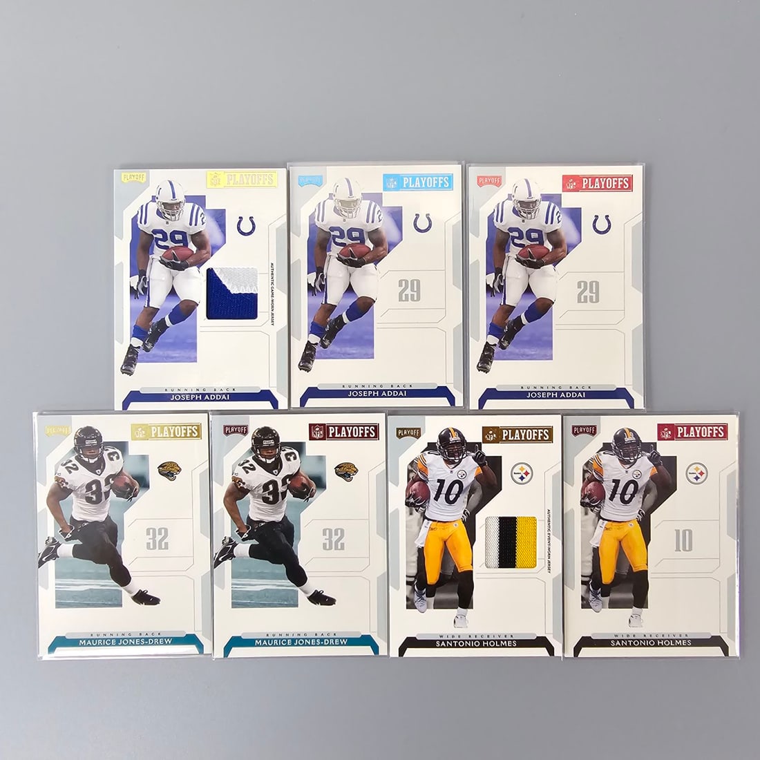 NFL player worn materials and numbered insert cards (1 of 20)