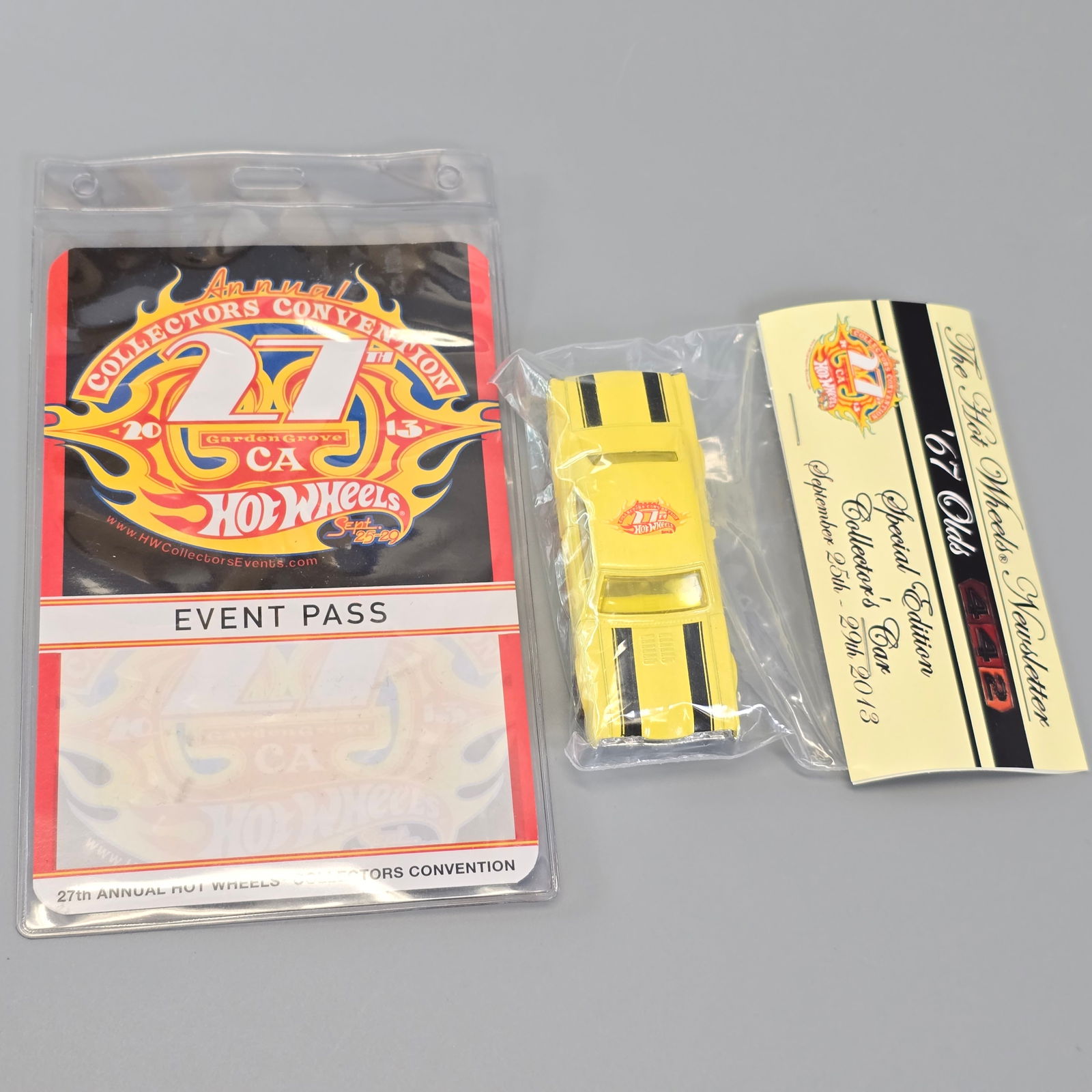 Hot Wheels 27th Collectors Convention 67 Olds 442 charity car and badge (1 of 5)