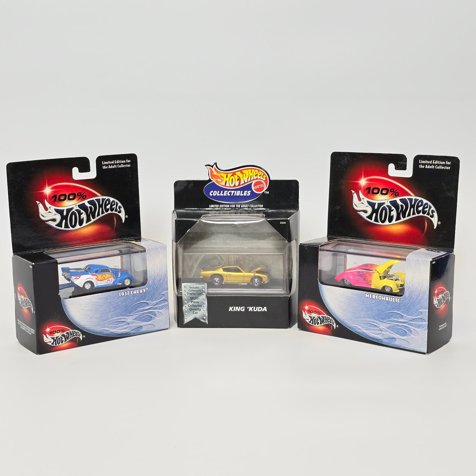 Hot Wheels 100% & more lot of 3: Includes: 1937 Chevy, Mercohaulic and King Kuda Boxes: very good with very light shelf wear in spots Blister/Bubbles: looks to be clear and firmly attached, little to no wear