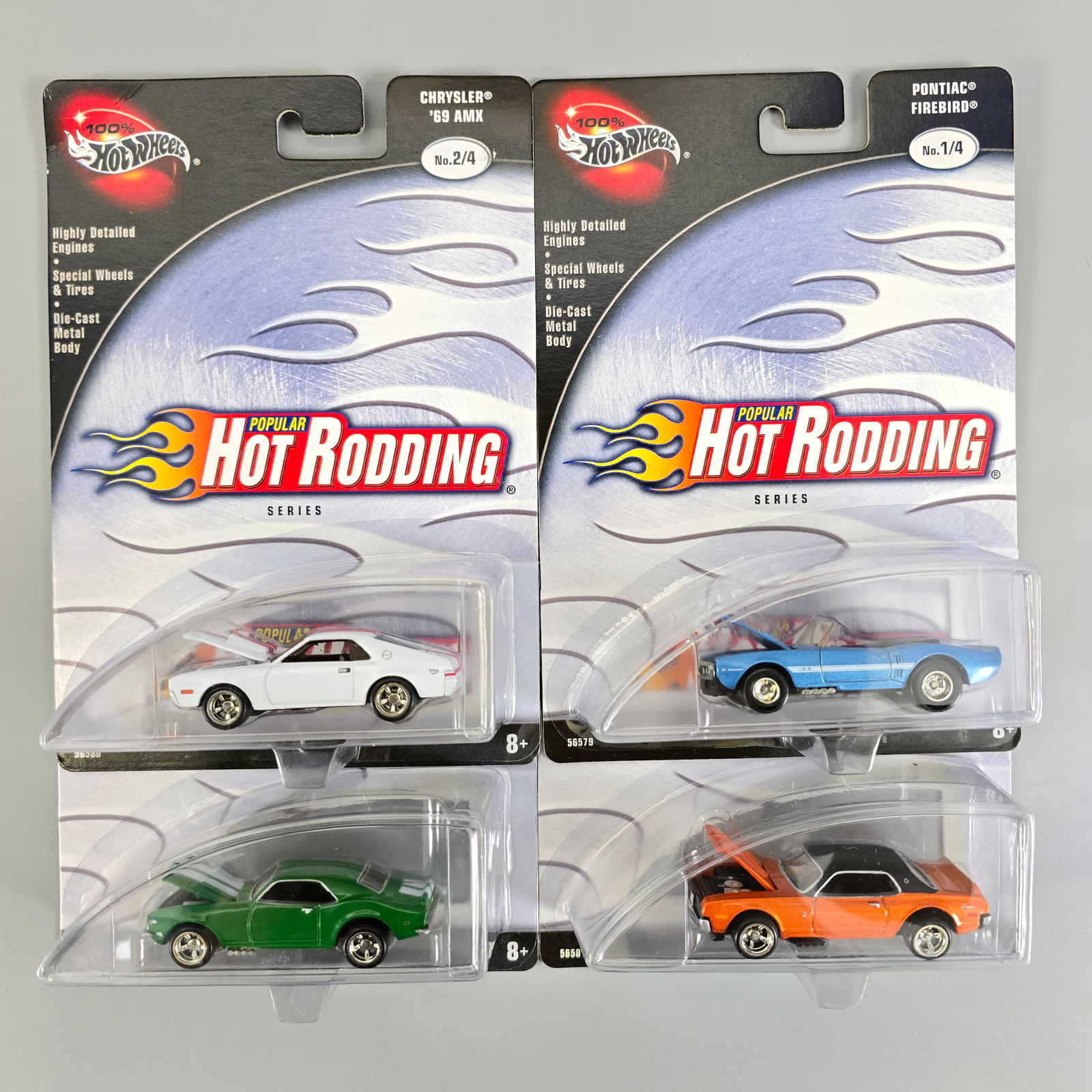 100% Hot Wheels Hot Rodding set with alt/ colors: These sets were offered in 2 colors for each car Includes: white 69 AMX, blue Pontiac Firebird, orange Mercury Cougar and green Chevy Camaro Cards: excellent with no issues of note except the AMX