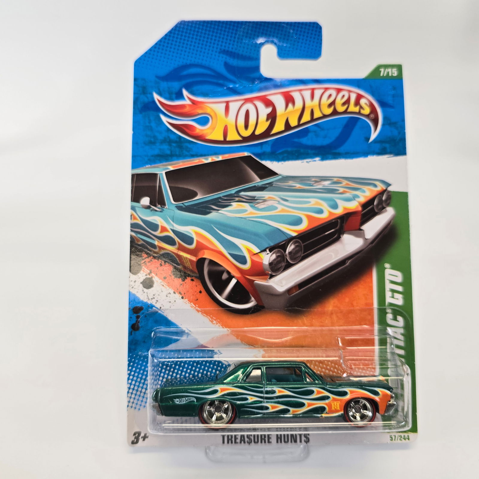 Hot Wheels Super Treasure Hunt '64 GTO: Hot Wheels 2011 Treasure Hunt '64 Pontiac GTO Card: very good with a minor surface vein with color loss as seen in the photos Blister/Bubble: clear, crack free and firmly attached to the card Item: