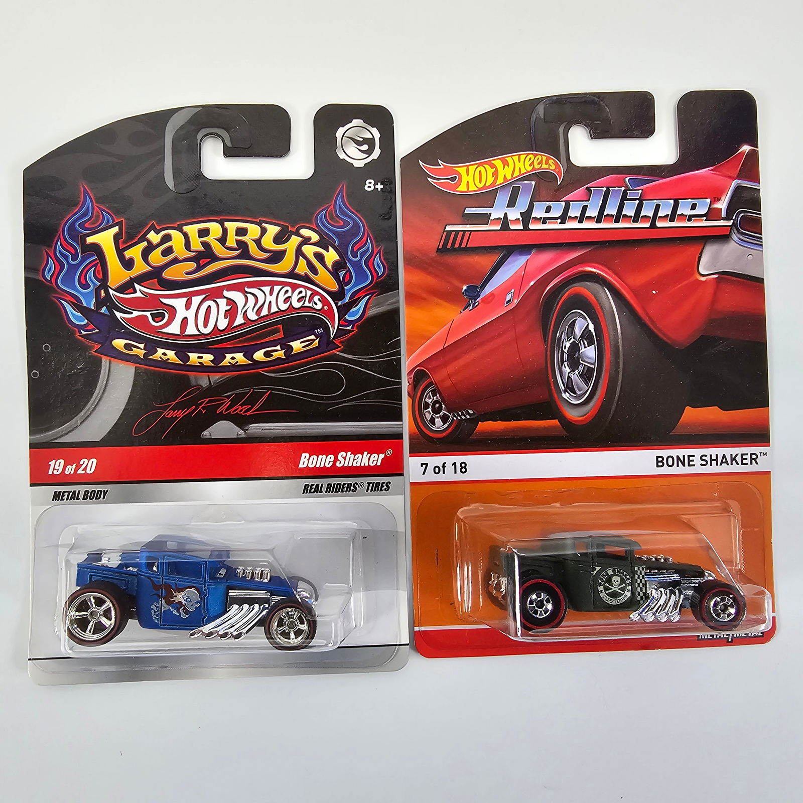 Hot Wheels Bone Shaker pair: Hot Wheels Bone Shaker pair, includes Redline and Larry's Garage editions Cards: Larry's Garage is excellent with no issues of note, Redline card has minor lower edge and corner wear in spots as seen