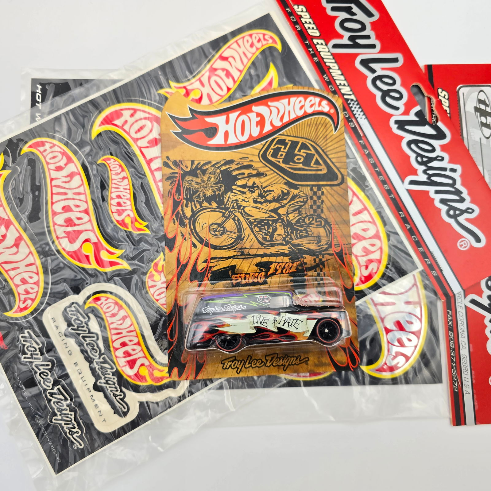 Hot Wheels Troy Lee Limited Edition: Hot Wheels Troy Lee Designs Love and Hate 1955 Chevy Panel truck with sticker sheets Card: excellent with no issues of note Blister: clear, crack free and firmly attached to the card Item: unopen