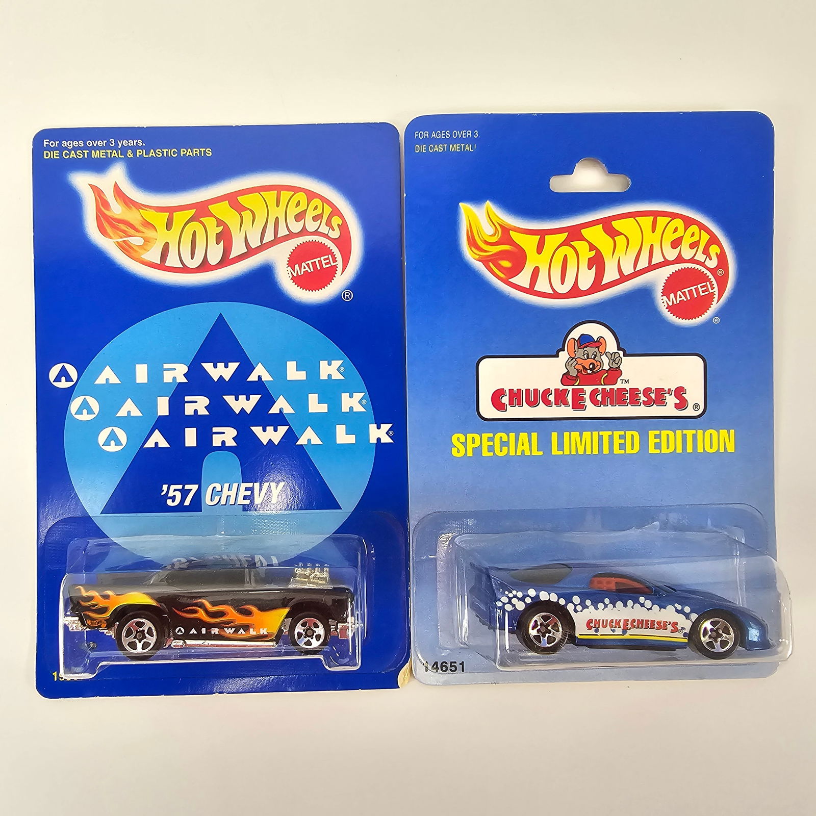 Hot Wheels Promo Cars Pair: Hot Wheels Promo car pair including, Chuck E Cheese Camaro and Airwalk '57 Chevy Cards: Chuck E Cheese is excellent, Airwalk is good but has a dinged up lower right corner and edge as seen in the pho