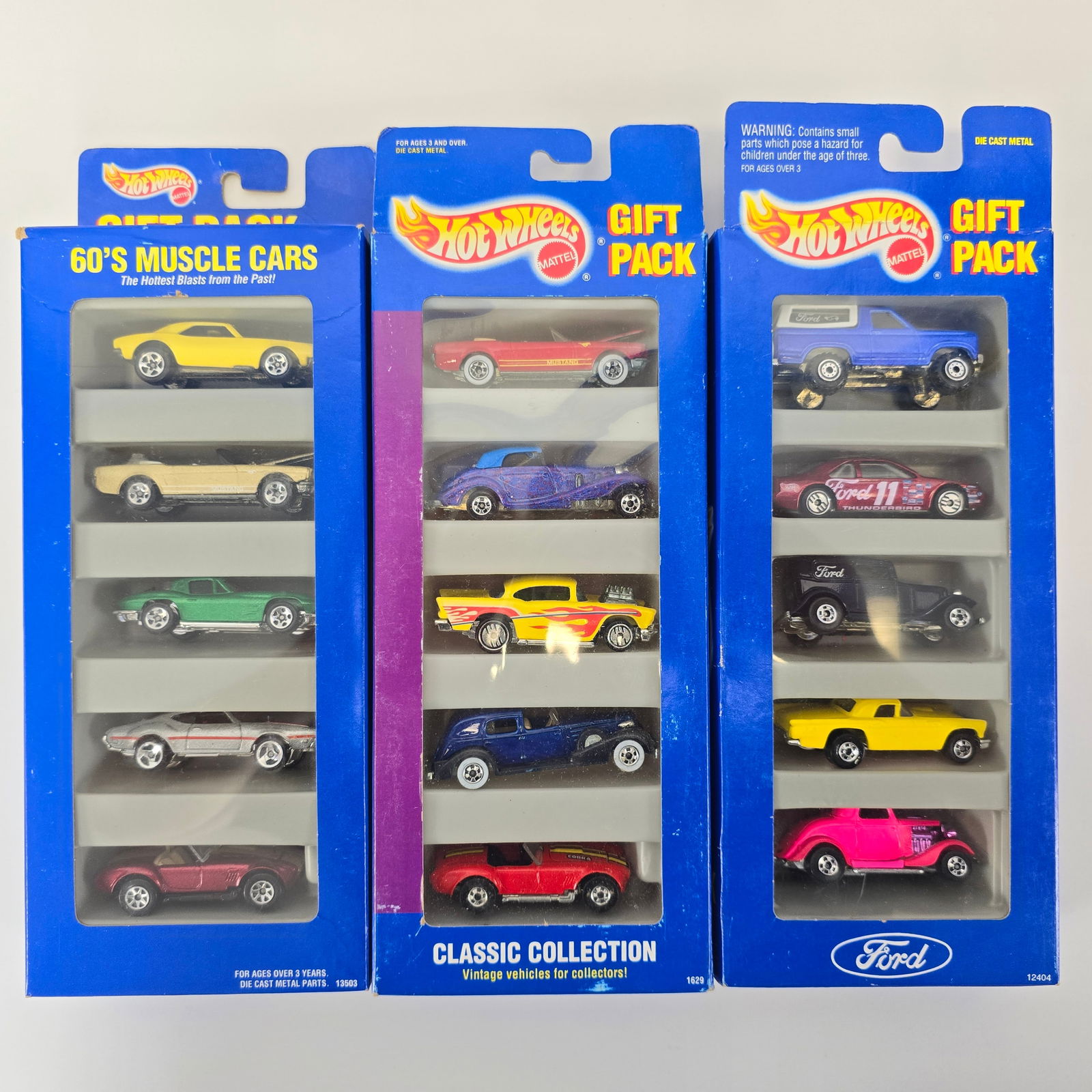 Hot Wheels Lot of 3 5-Packs: Hot Wheels lot of 3 5-pack Gift Sets including, 60's Muscle Cars, Ford and Classic Collection Boxes: all are sealed and very good to excellent with minor edge wear in spots as seen in photos Bliste