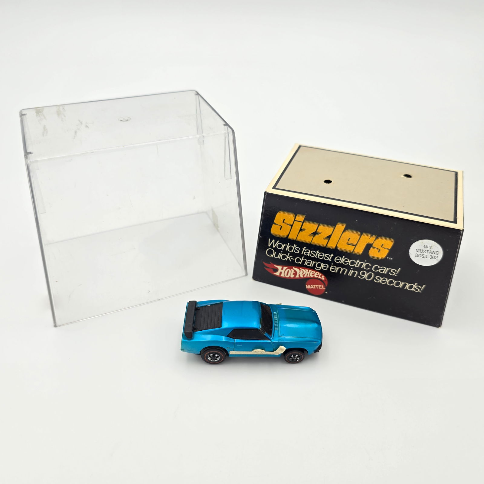 Sizzlers Mustang: 1970 Mattel Hot Wheels Sizzlers Blue Mustang Boss 302 Case: Solid and crack free, may have light scratches and scuffs but nothing of note, solid insert Car: Overall paint is very good, there is s