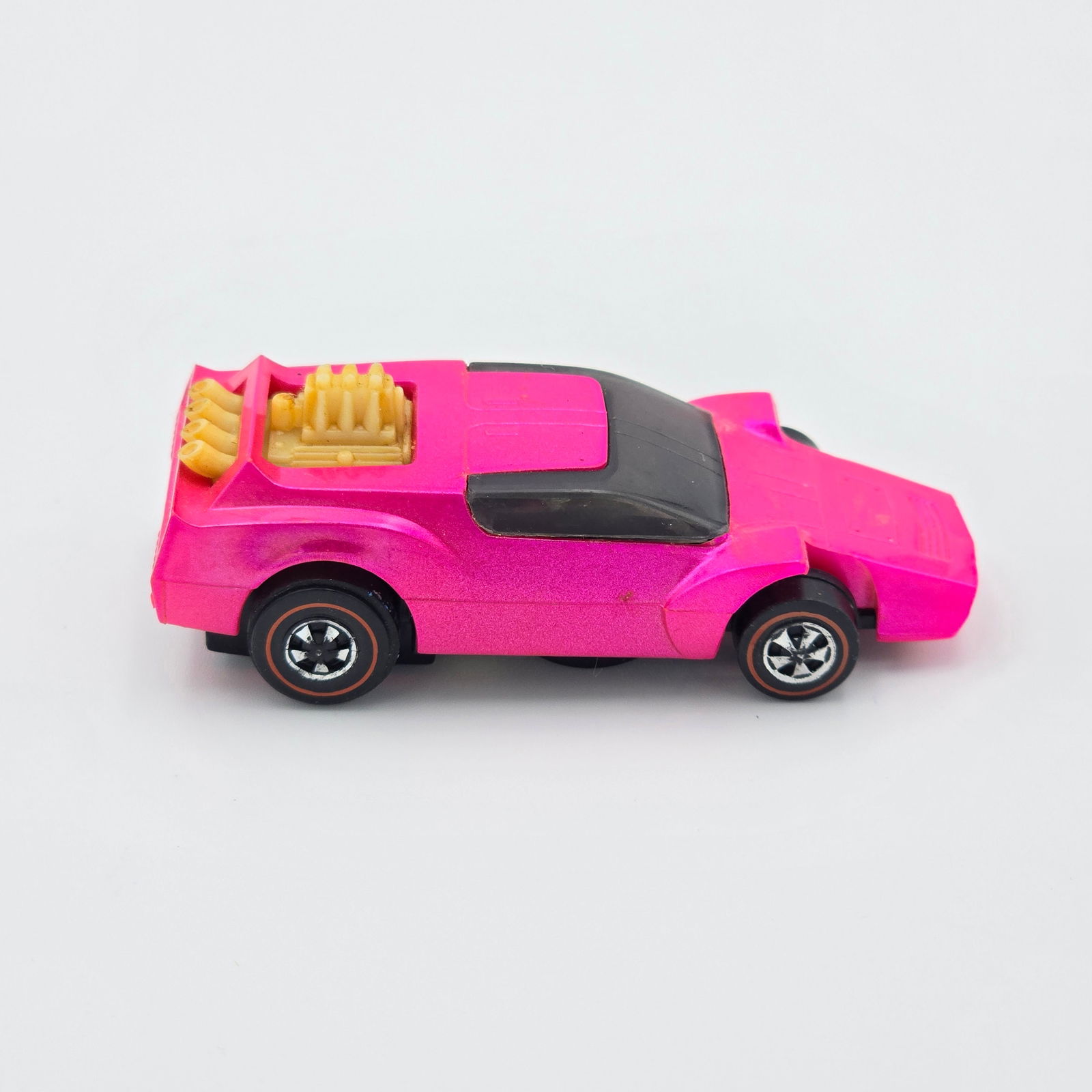 Sizzlers Back Fire: 1971 Mattel Hot Wheels Sizzlers pink Back Fire Car: excellent body color, engine chrome is gone, excellent wheel chrome with light loss on passenger side rear