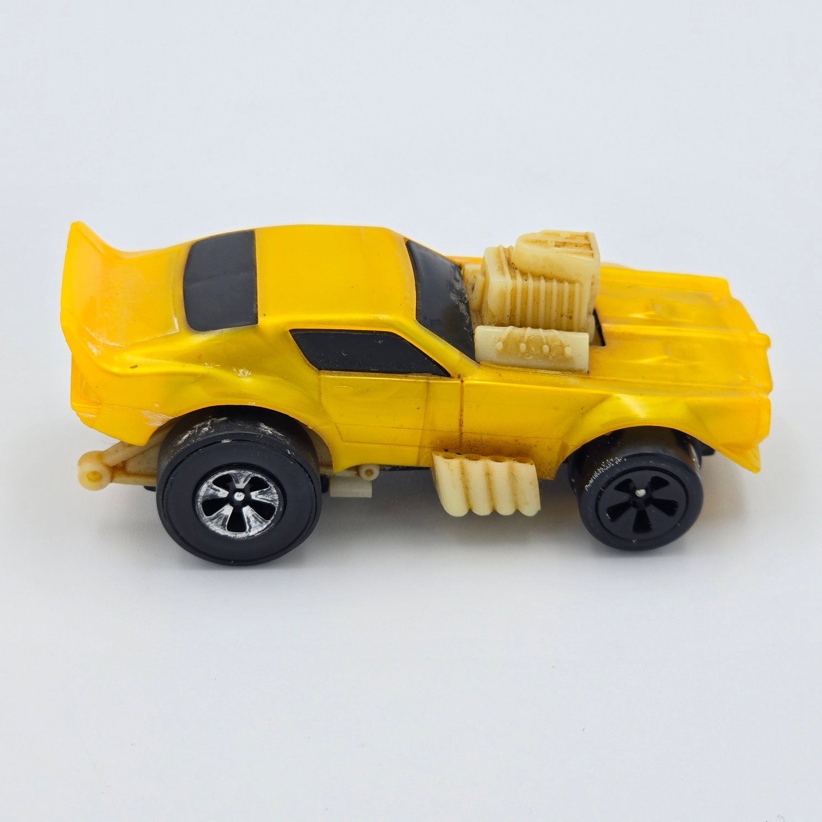 Sizzlers Fat Daddy Fireworks: 1973 Mattel Hot Wheels Sizzlers yellow gold Fat Daddy Fireworks Car: body is excellent, engine and drag bar chrome is missing, front wheel chrome is gone, rear chrome is worn as seen