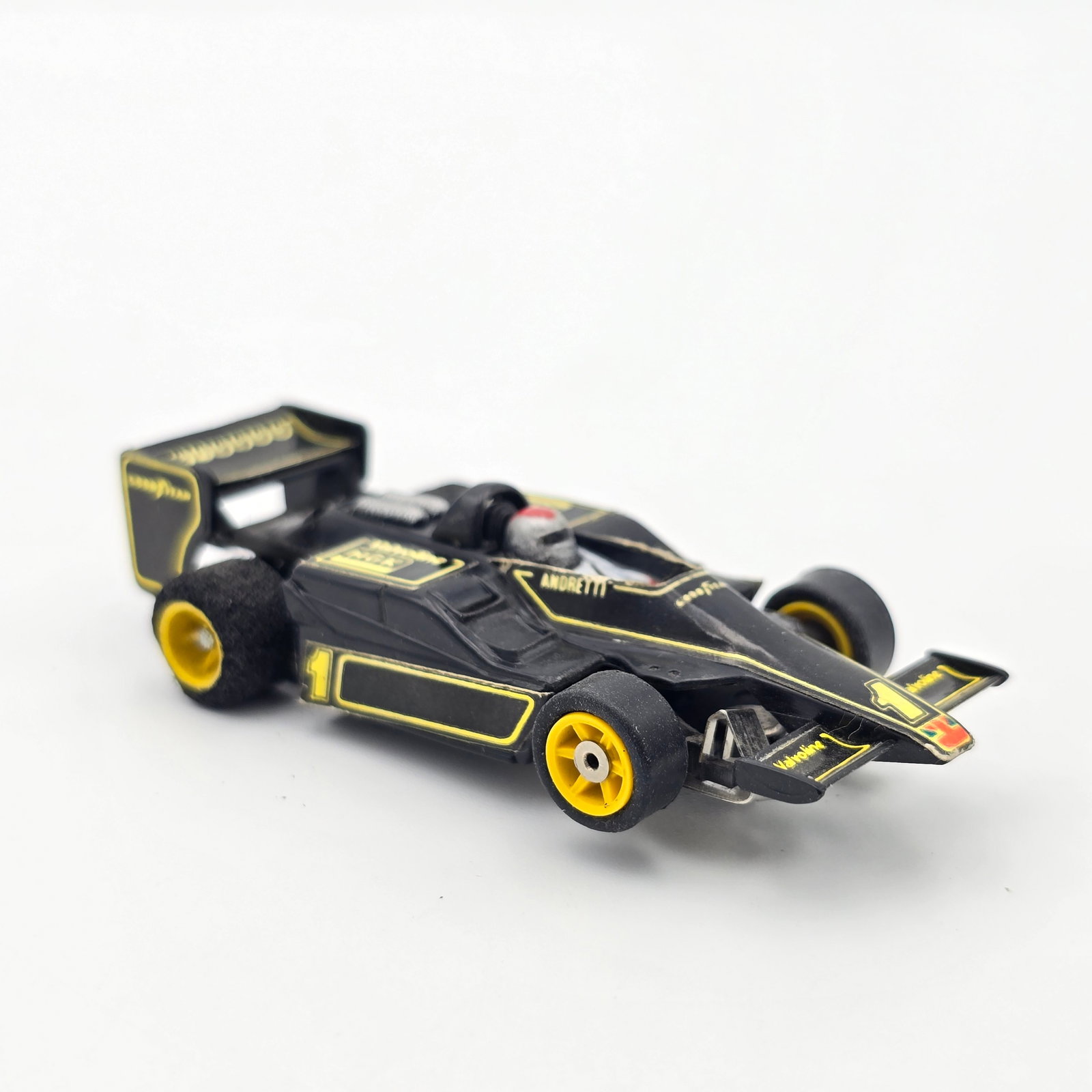 Aurora AFX G-Plus F1 Lotus: Aurora AFX G-Plus F1 Lotus Car appears to be complete and in good condition, light wear to pick up shoes, rear foam wheels have wear