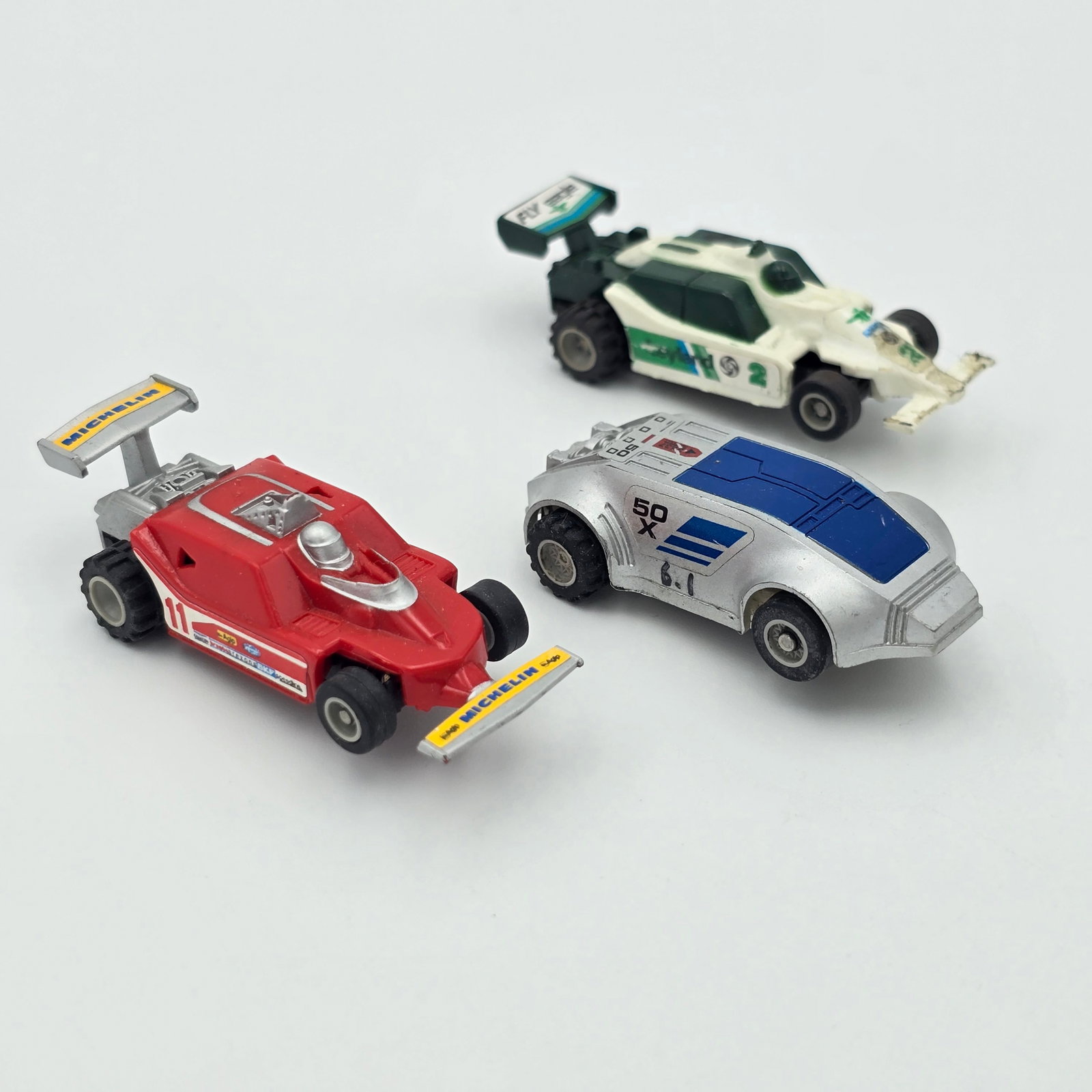 Lot of (3) Japan Slot Cars: Lot of (30) japanese slot cars All appear to be in very good or better condition, the "Fly Eagle" car has decal and front end wear as seen, pickup shoes show wear