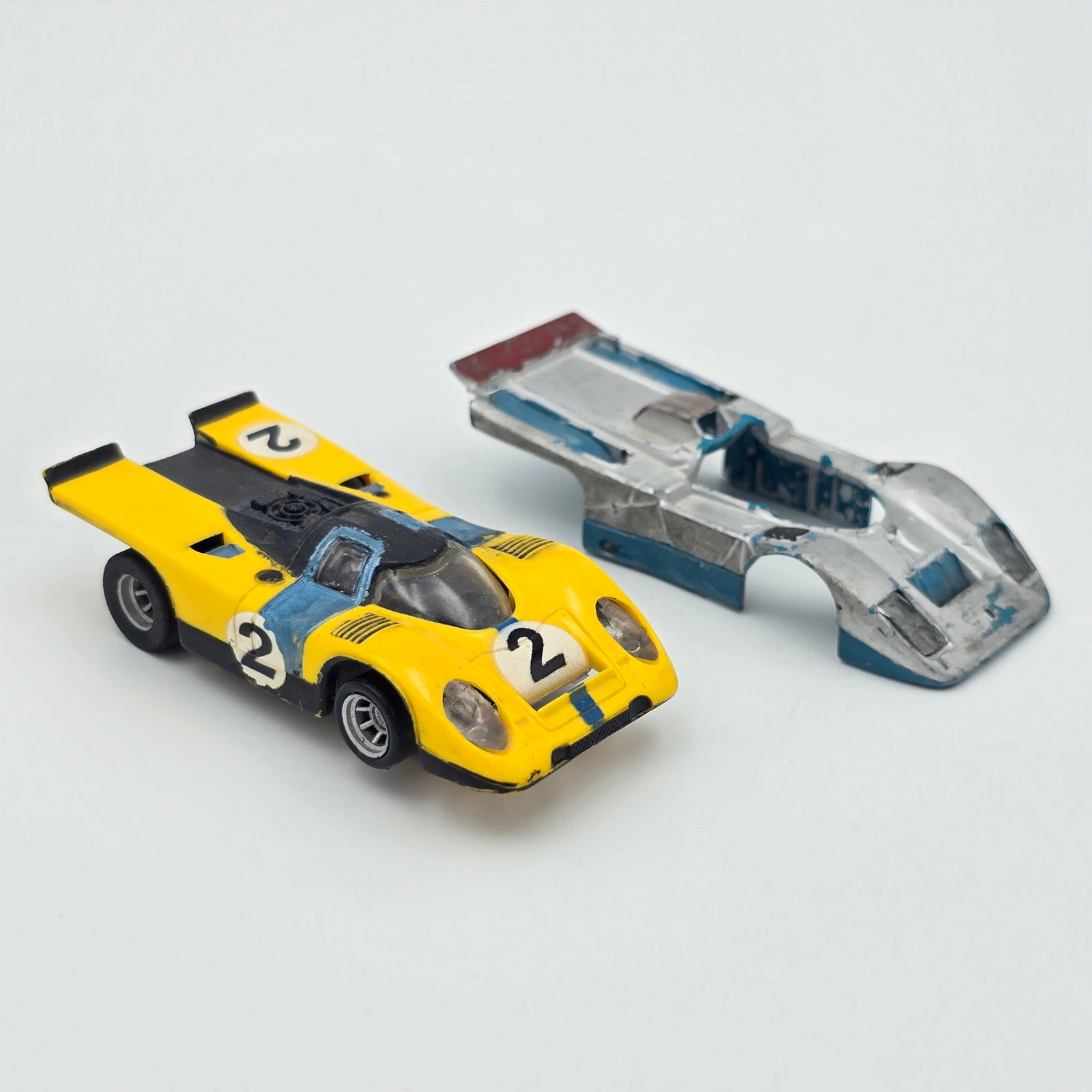 Aurora AFX Porsche 917 and Body: Aurora AFX Porsche 917 and Ferrari 512M Body only Cars: Porsche 917 appears to be in good condition with kid painted details all around, the Ferrari 512M is just the body, no glass and has been kid pa