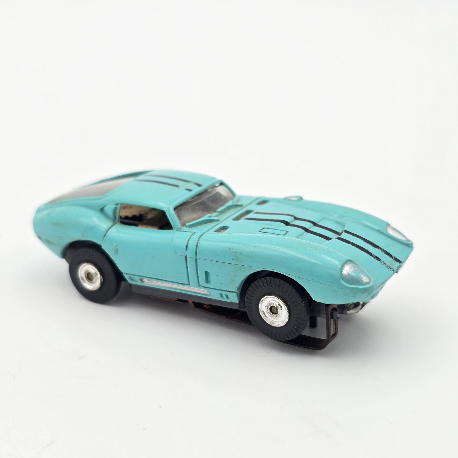 Aurora TJet Cobra GT HO Slot Car: Aurora TJet Cobra GT HO Slot Car Car is overall very good with scattered light wear to detail paint as seen, pickup shoes show light wear