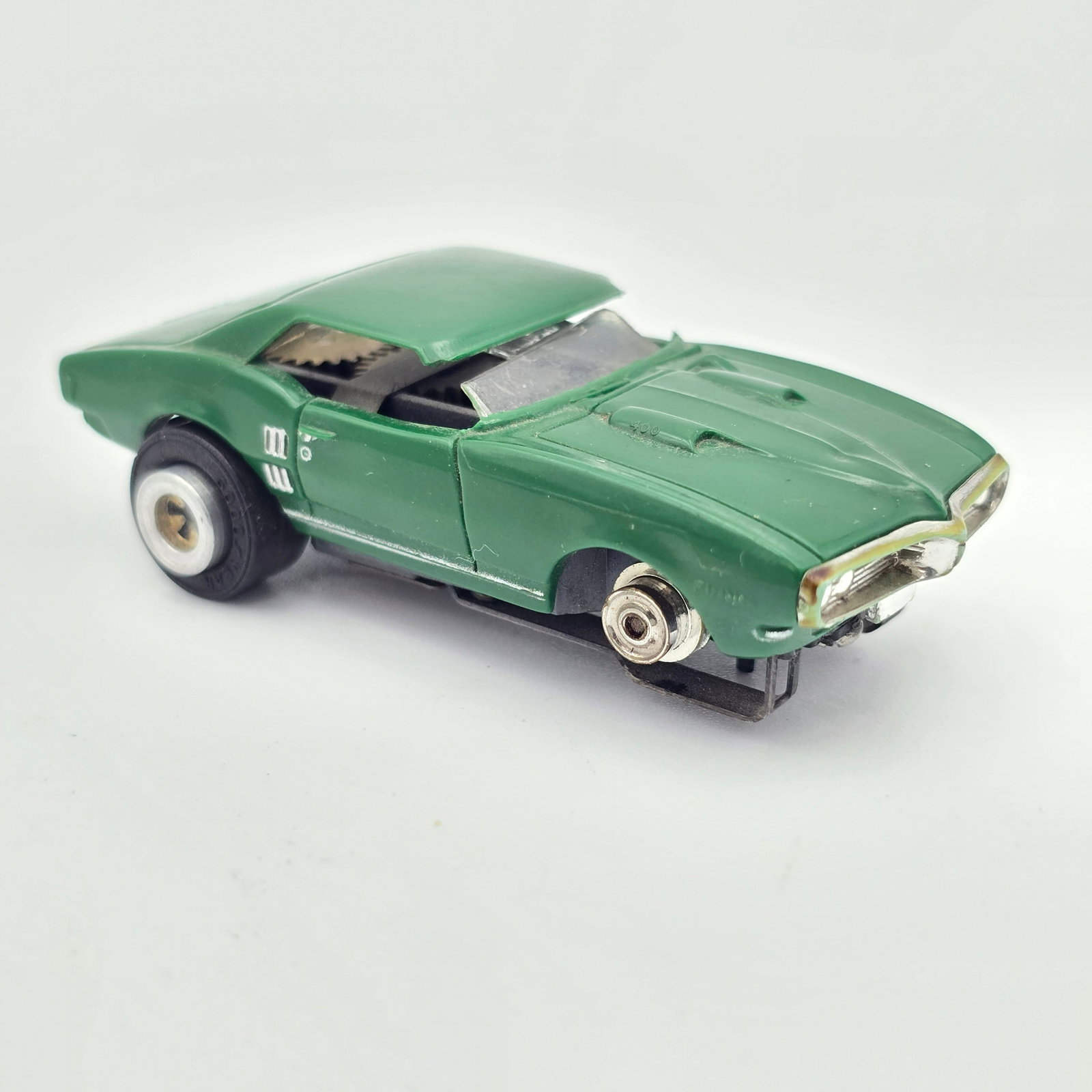 Aurora '68 Firebird HO Slot Car: Aurora '68 Firebird HO Slot Car Car is fair as it is missing both A pillars, it is missing a front tire rubber, pickup shoes show little to no wear
