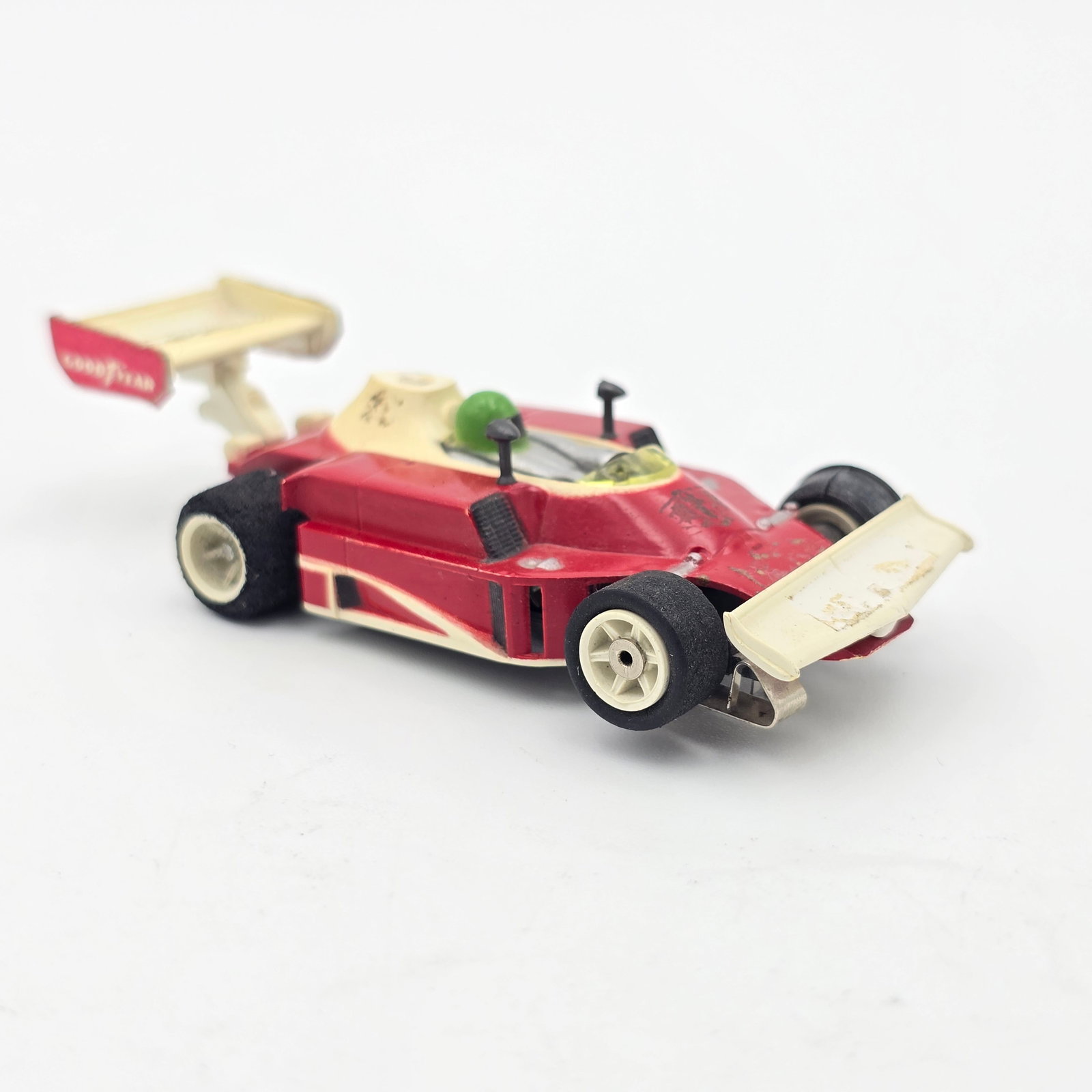 Aurora AFX G-Plus McLaren Slot Car: Aurora AFX G-Plus McLaren Slot Car Car is very good but missing all decals, the rubber and foam wheels on the drivers side are in need of replacing and it is missing a pickup shoe as seen