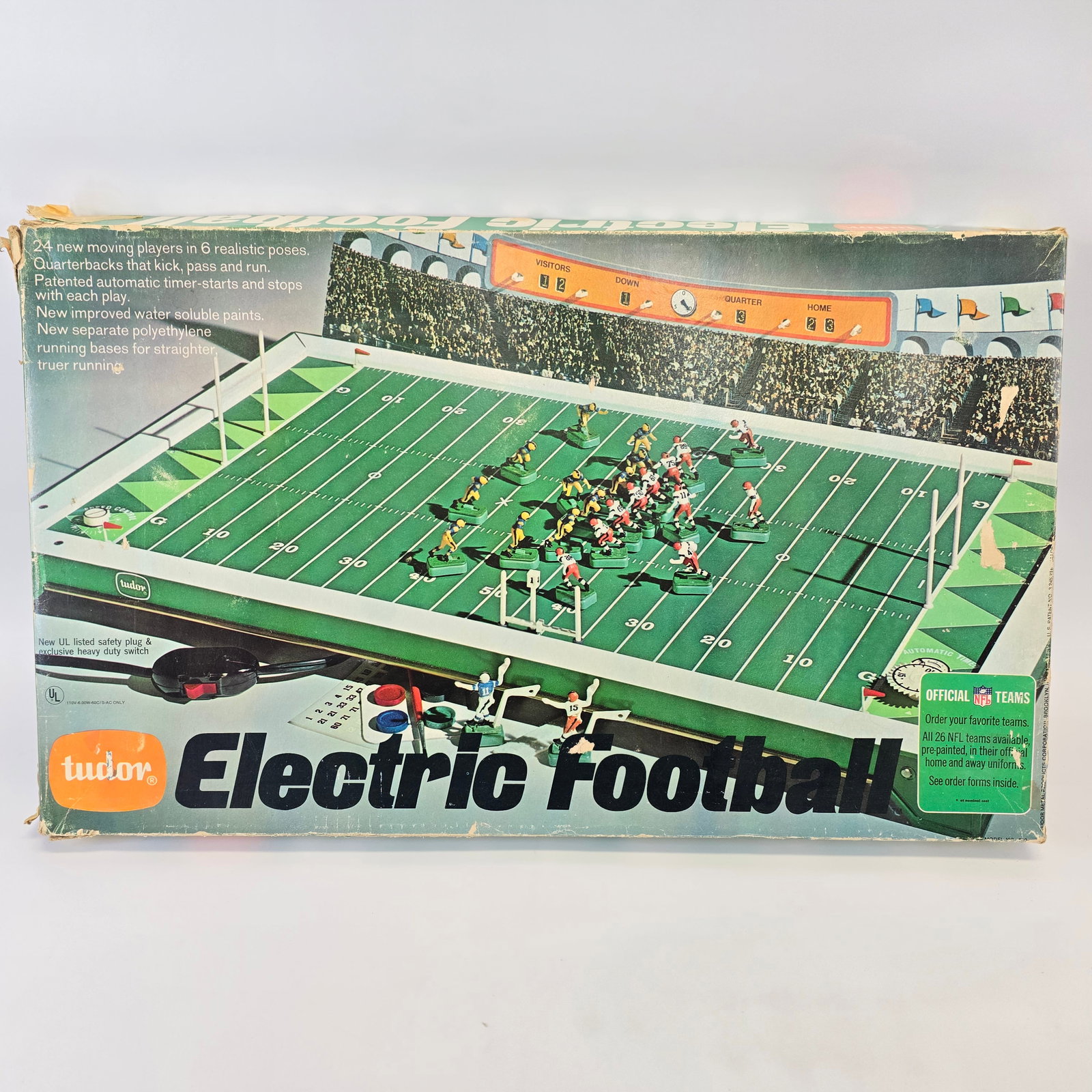 Tudor Electric Football Game Set: Tudor Game Set Includes original box, score cards, decals, rule book, other paperwork, field, original box and more ox shows some wear including torn and taped corners and the set itself is in used co
