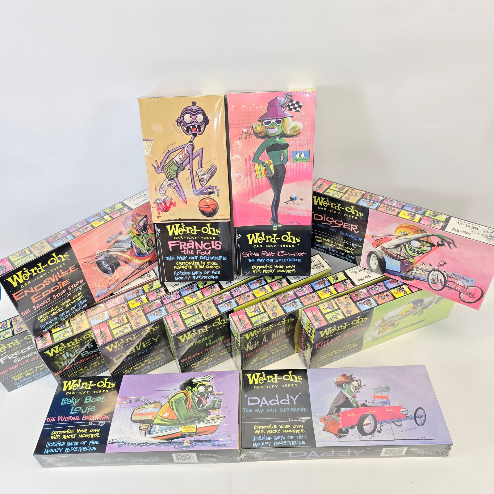 Hawk Weird-ohs Model Kit Lot of (12): Re-Issue(2006) Hawk Weird-ohs Model Kit Lot of (12) Includes: Hueys Hut Rod, Leaky Boat Louie, Wade A Minute, Drag Hag, Sling Rave Curvette, Francis the Foul, Endsville Eddie, Davey, Freddys Flameo