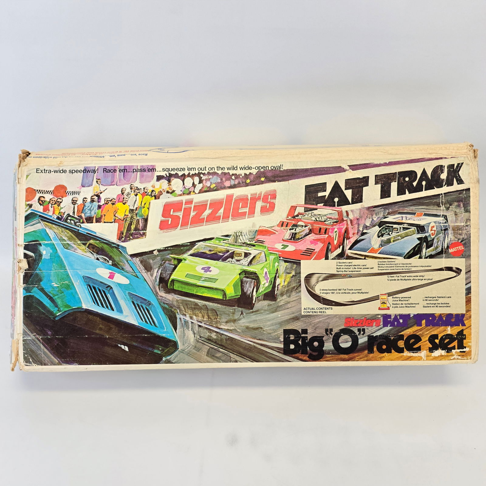 Sizzlers Fat Track Big "O" Race Set: Canadian issue Sizzlers Fat Track Big "O" Race Set No cars present, but there are track and a juice machine included as well as some other piece and may be missing other parts but what is he