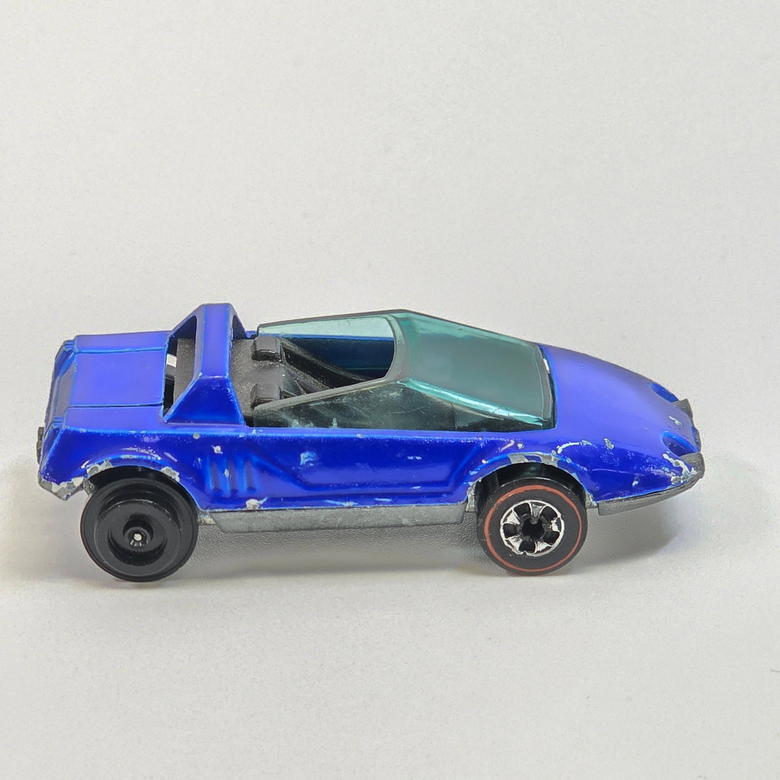 Hot Wheels Redline Sand Witch: Enamel Sand Witch - Dark Blue - Dark Good condition, has wear and chipping around the perimeter as seen, the top sides are in good condition compared to rest of car. Glass is excellent. Wheel ch