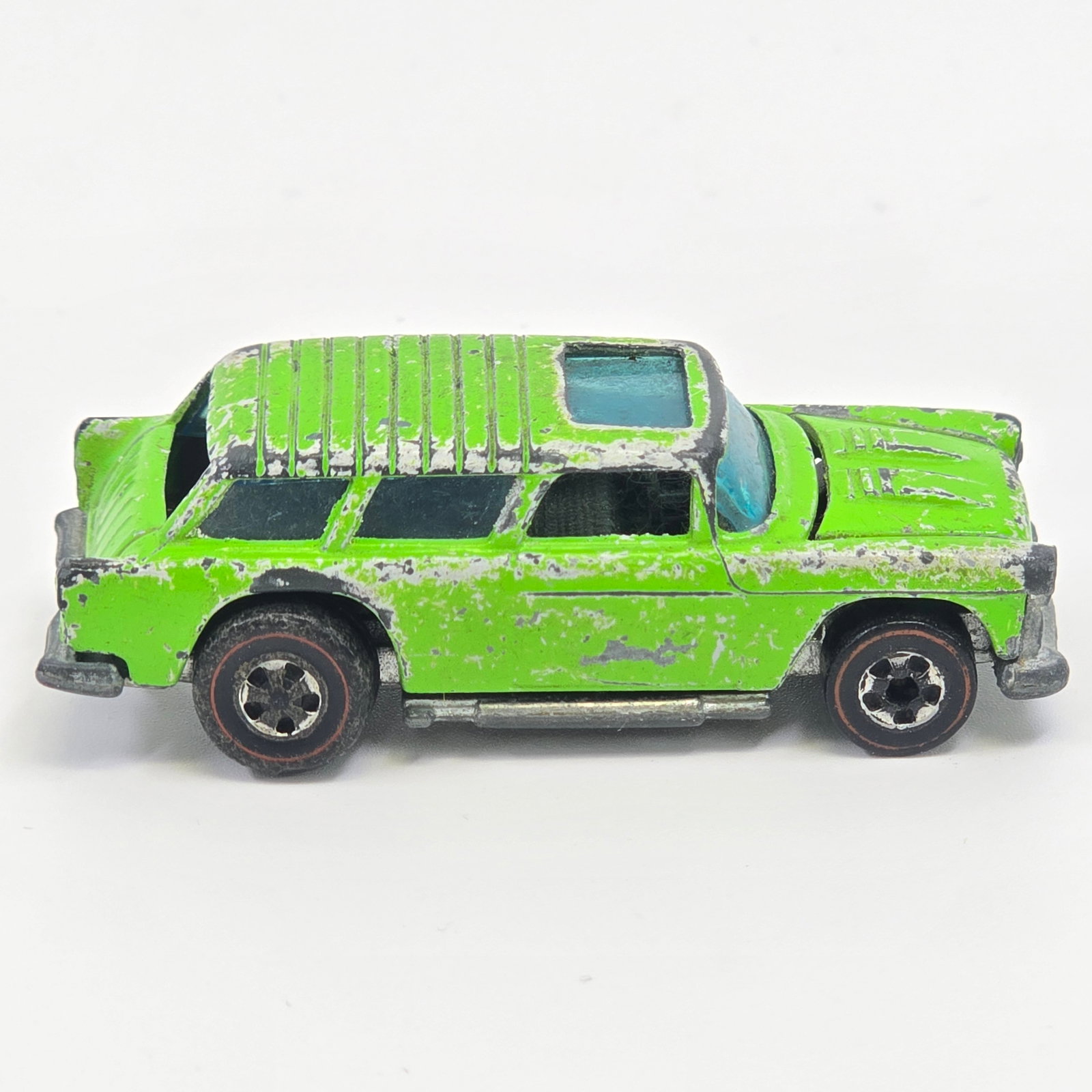 Hot Wheels Redline Alive '55: Enamel Alive '55 - Light Green - Dark Interior Fair condition, has substantial wear and paint loss as seen. Glass is scratched considerably. Wheel chrome is mostly missing. Base is tarnished.