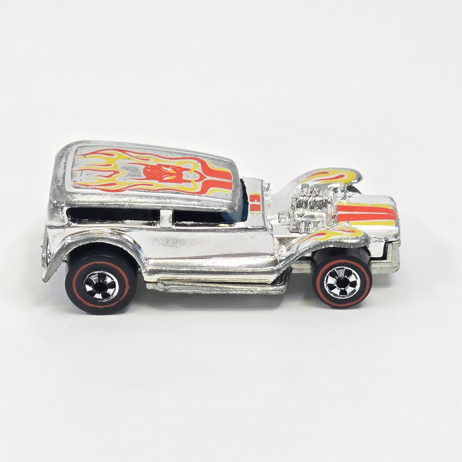 Hot Wheels Redline Prowler: Super Chromes Prowler -Chrome - Red and Yellow tampos - Dark interior Very Good condition, has light wear possibly at some high edges. Great glass. Tampos are excellent. Wheel chrome is very good with