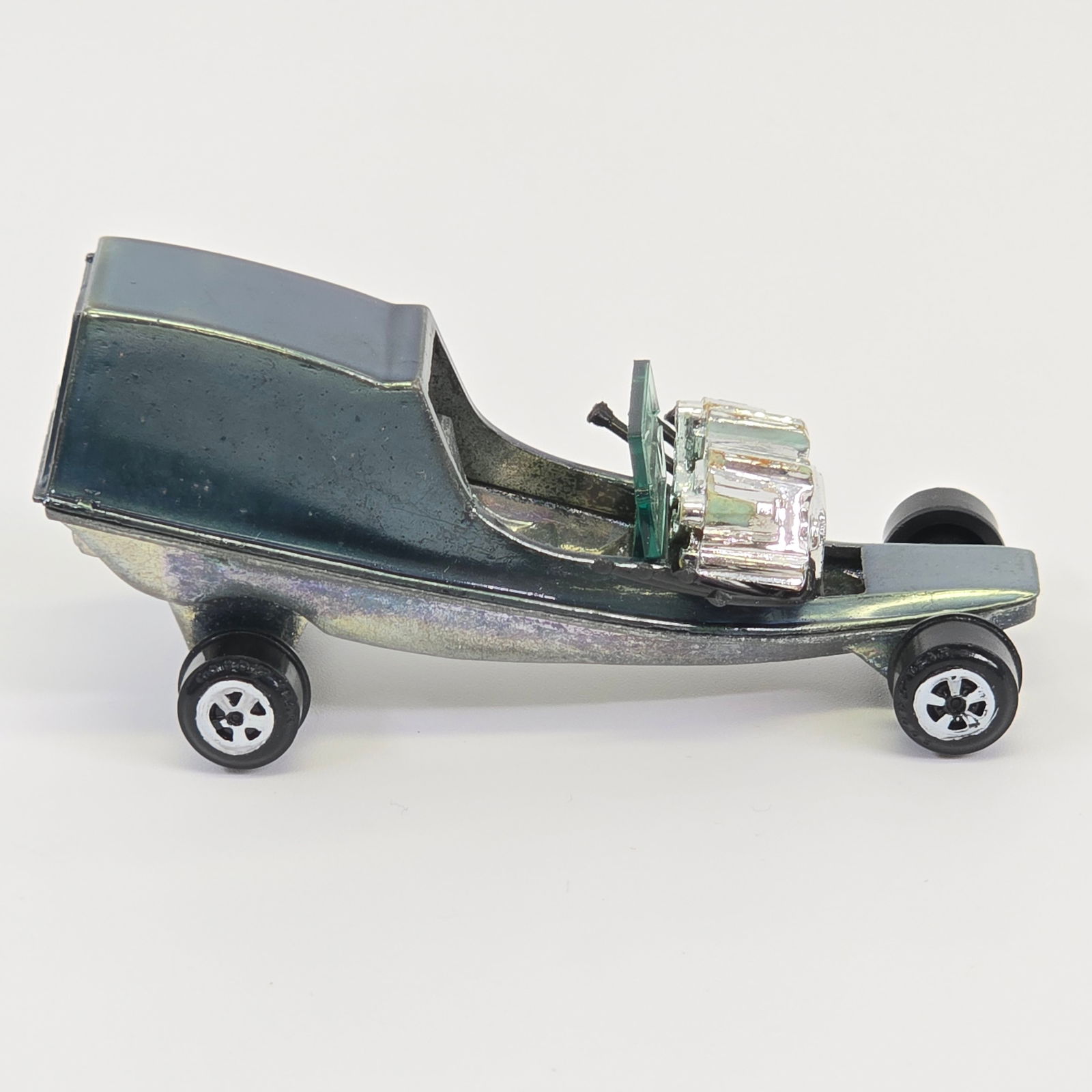 Johnny Lightning Topper Movin Van: Johnny Lightning Topper Movin Van - Teal with Zamac interior Car is overall excellentwith no issues of note, excellent glass, the wheels are excellent, clean base.