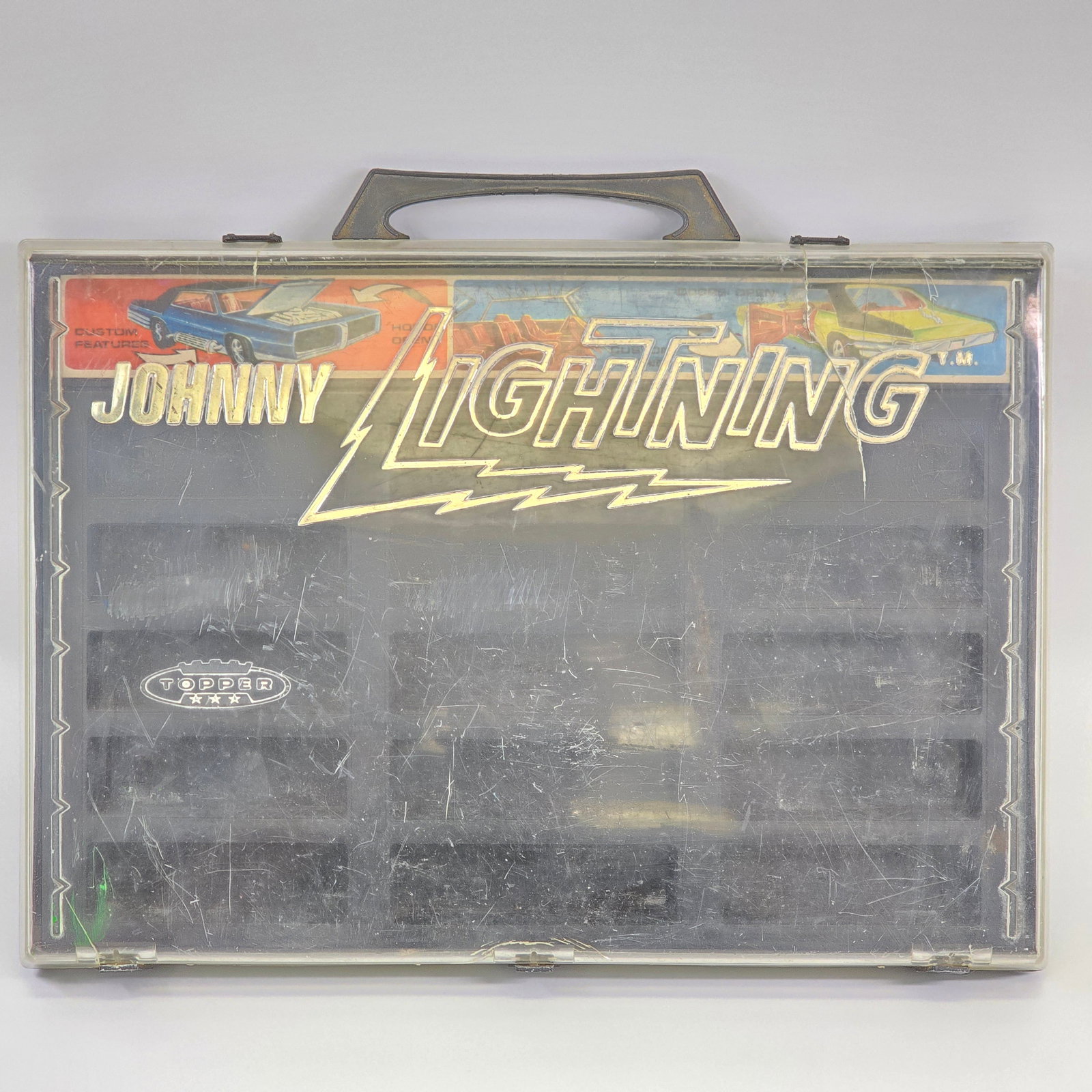 Johnny Lightning Topper case: Johnny Lightning Topper case Case is solid but cover has substantial scuffing and scratching as seen, decals are good, case itself appears solid but needs to be detail cleaned.