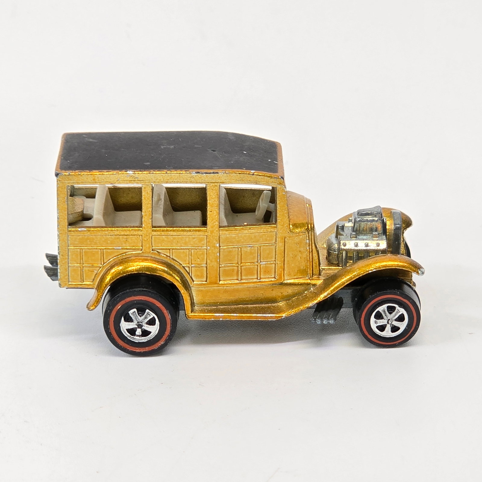 Hot Wheels Redline Woodie: Hot Wheels Redline Classic Woody - Gold with White interior - smooth roof Car is overall very good, it does have scattered hard edge wear, especially at front edge of front fenders and around ro