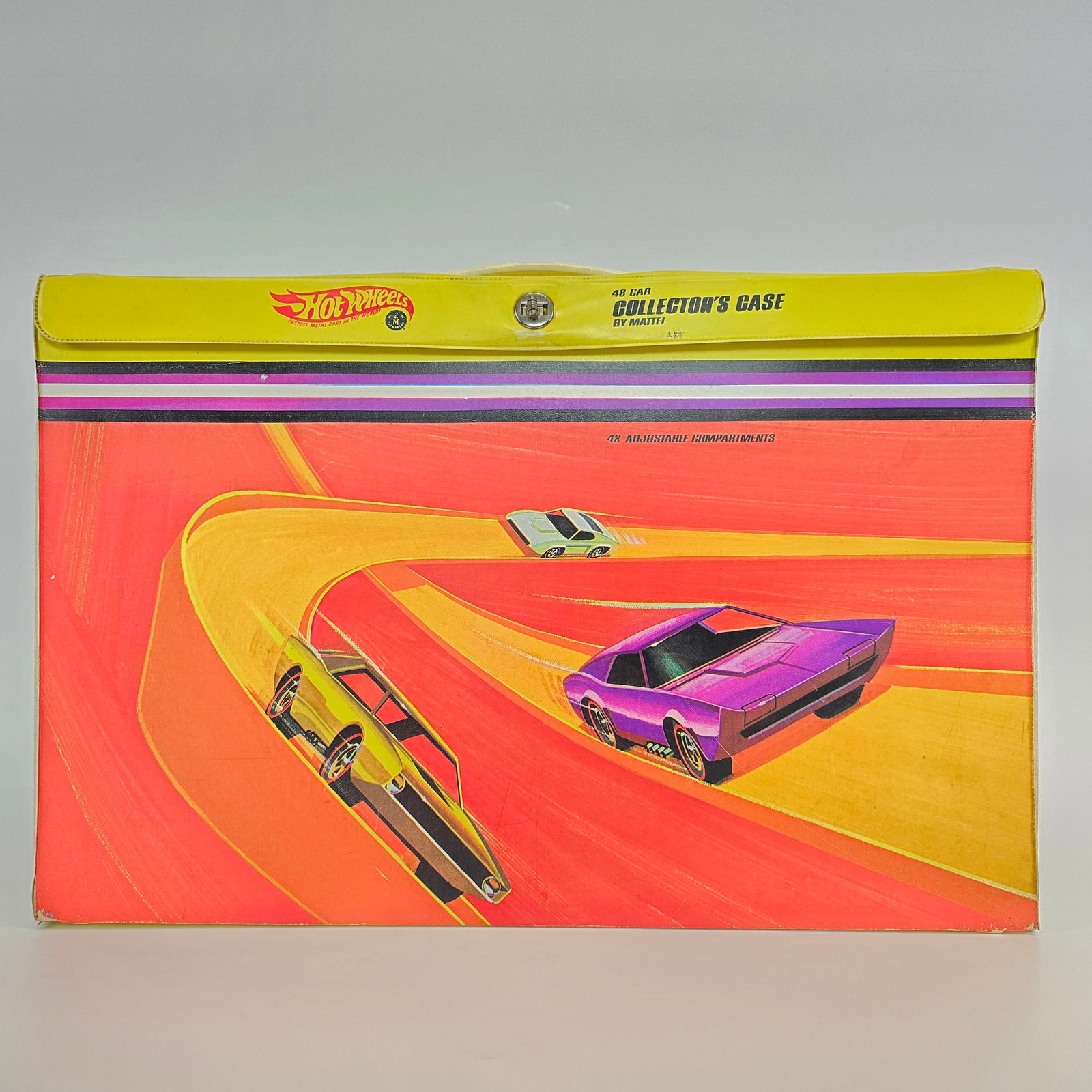 Hot Wheels Redline collector case: Hot Wheels Redline era 48 car collector case Case is solid with clean graphics, has minor shelf wear in spots, a few minor seam splits. Has original handle, snap closure. Original inside decal intact 