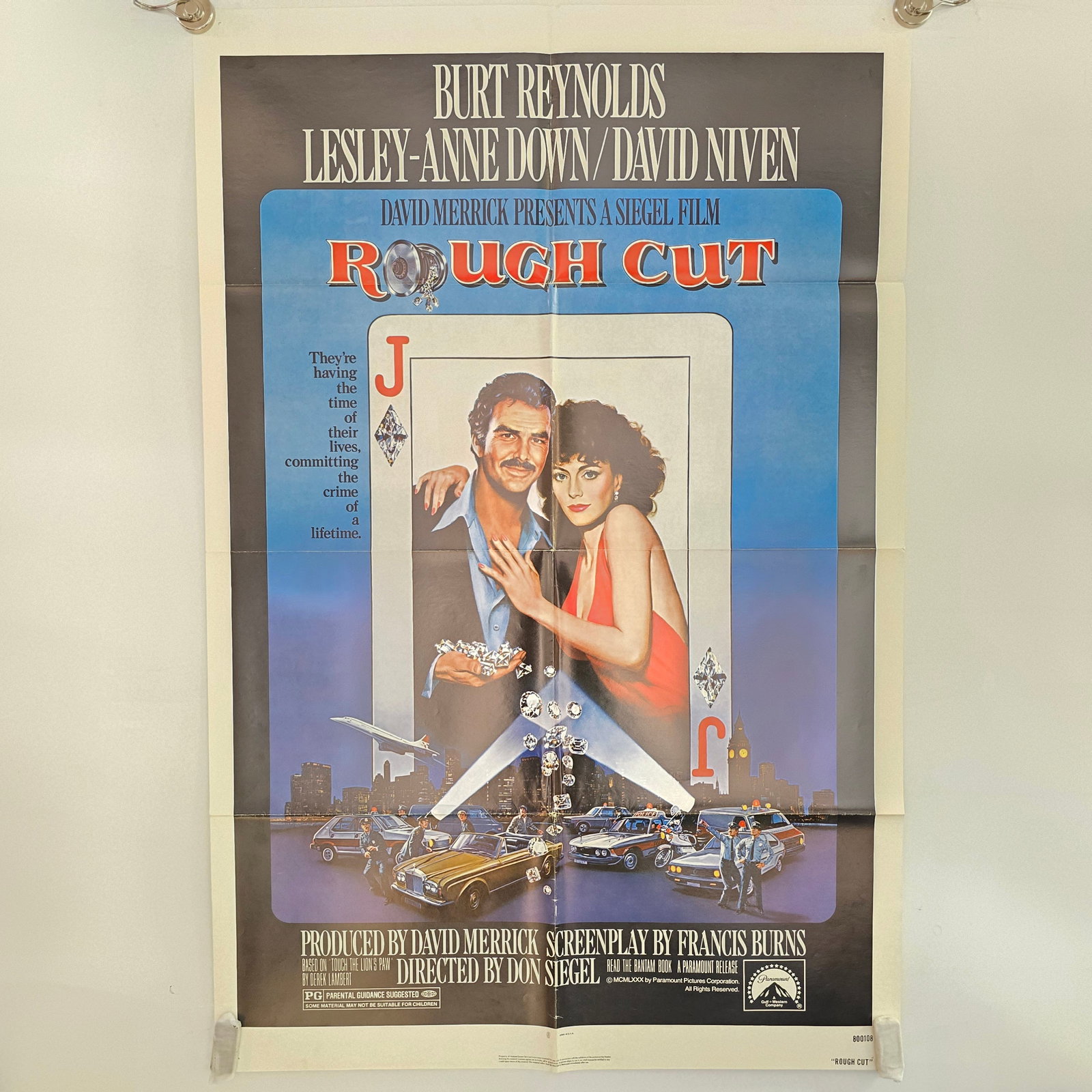 Rough Cut Movie Poster: 1980 Rough Cut Original Folded 1 Sheet Movie Poster Poster was stored folded and has subsequent wear including pin holes, creasing, and light yellowing. 
