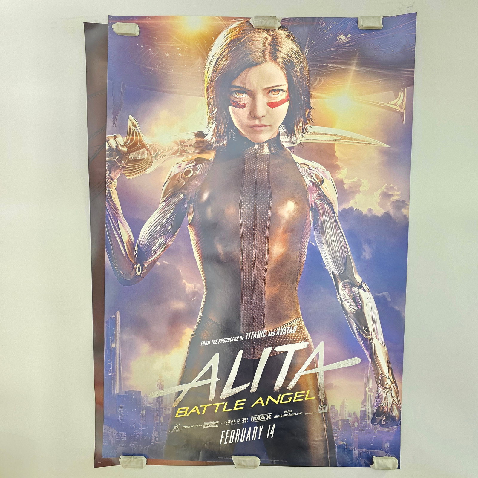 Pair Alita Movie Posters: (2) 2019 Alita: Battle Angel Original Rolled Double Sided Movie Posters Both posters appear in overall good condition. Both exhibit light fading on reverse side. 