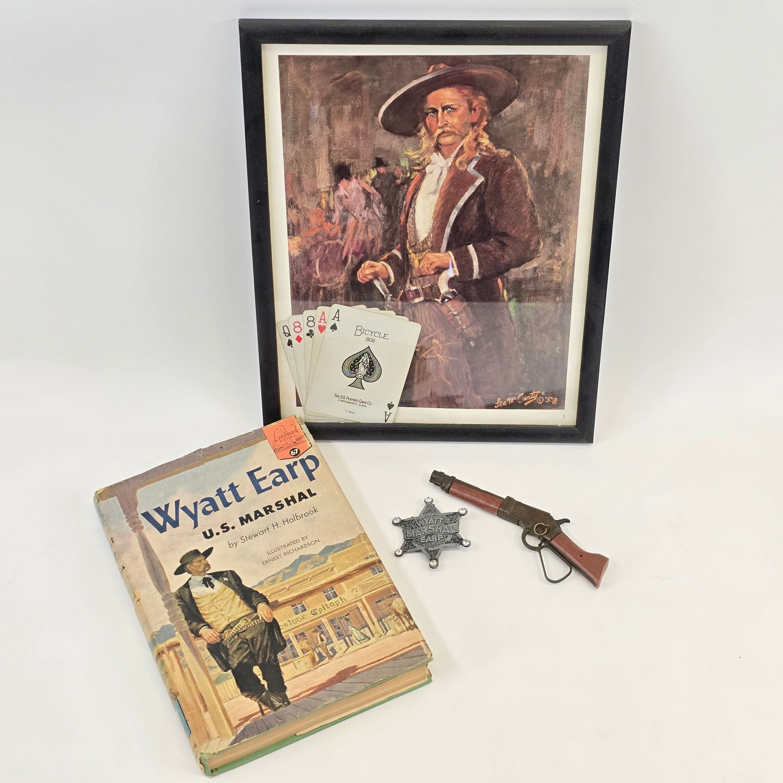 Lot of 1950s Western Items: Lot of (4) 1950s Western-Themed Items Including: - Marx, Wanted Dead or Alive TV Series 5 1/2" Miniature Mares Laig Toy Cap Gun. Gun is in overall good condition. Untested. - 1957 Wyatt Earp Mars