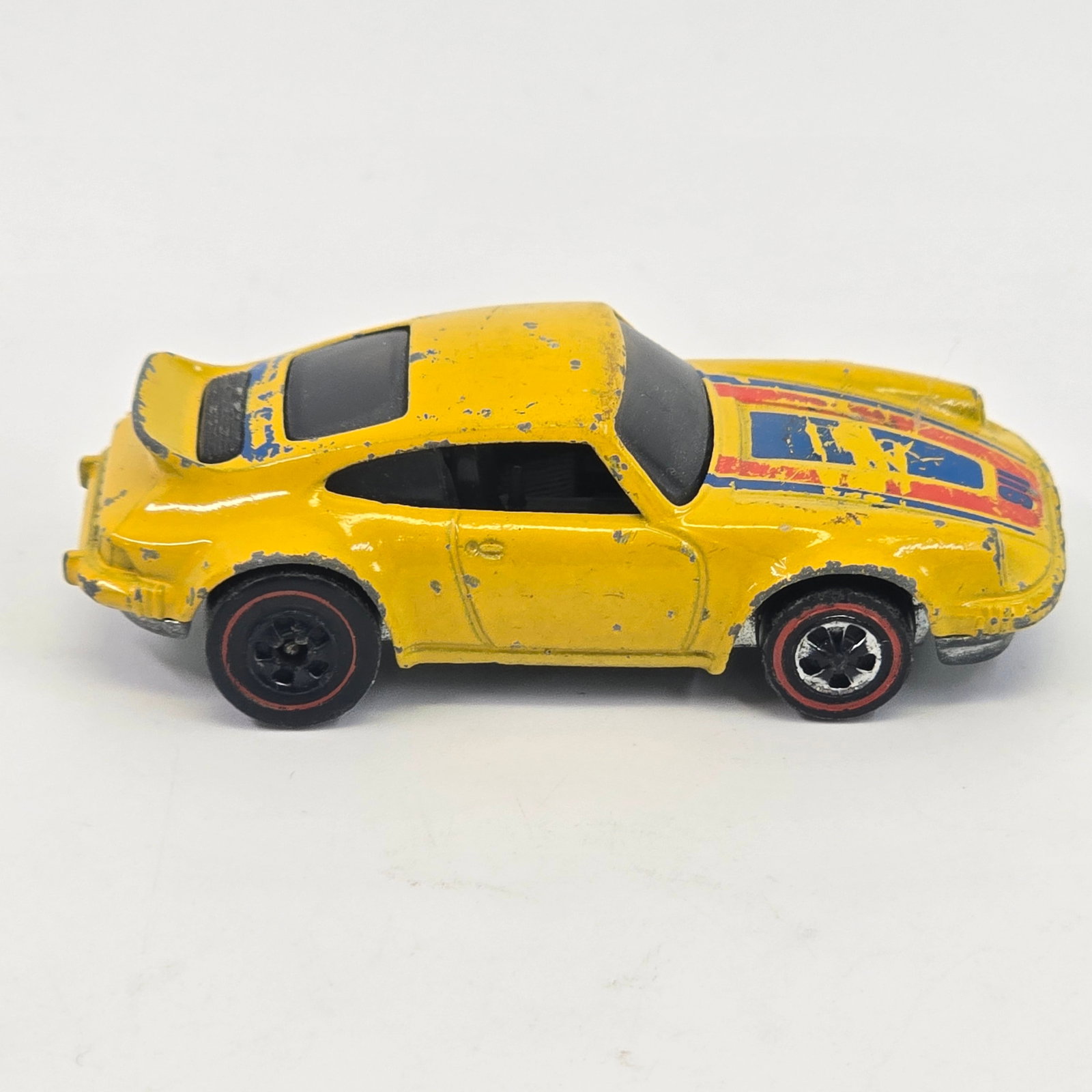 Hot Wheels Redline Porsche: Hot Wheels Redline Porsche Paint: Fair with significant wear as seen Tampos: Poor Wheel Chrome: Poor Glass: Good Base: Tarnished