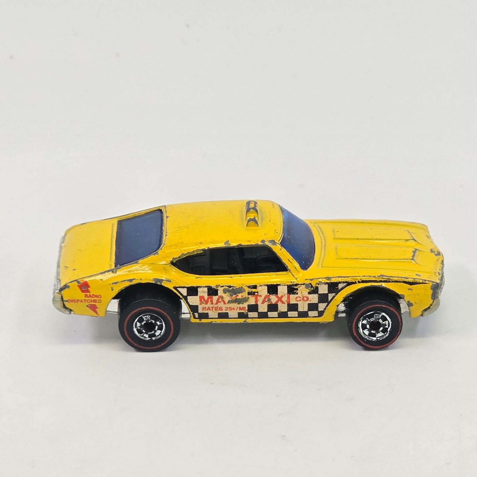 Hot Wheels Redline 442 taxi: Hot Wheels Redline Maxi Taxi Paint: Fair with heavy hard edge wear as seen Tampos: Fair with wear Wheel Chrome: Very good with light wear in spots Glass: Fair with scratches Base: Fair with chrome los